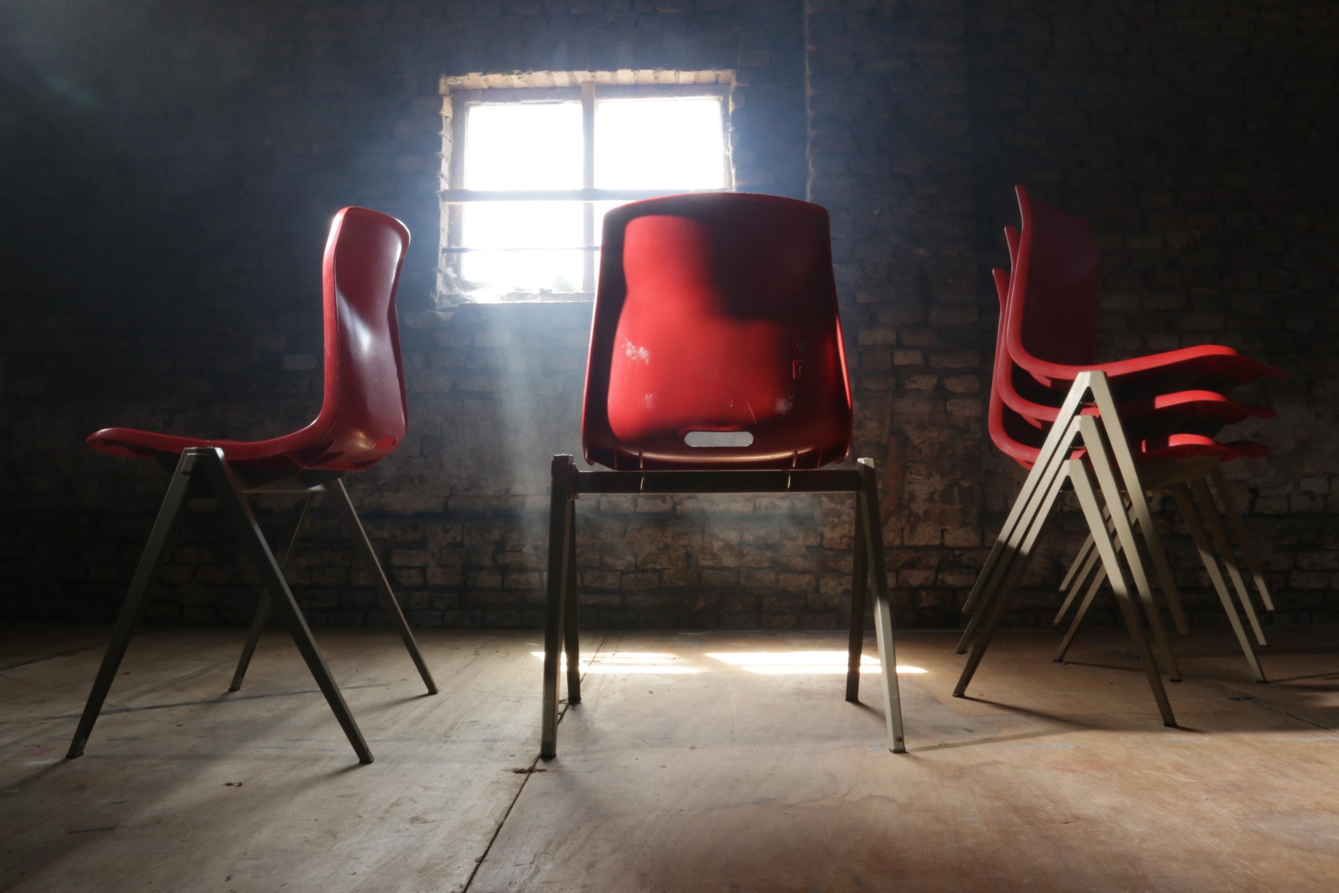 Industrial Galvanitas S22 Compass / Pyramid School chairs from the 1960s.
The chair has a light gray coated metal frame, a plastic molded seat with closed shell in a red color.
This legs are very easy stack able on each other. In this way you