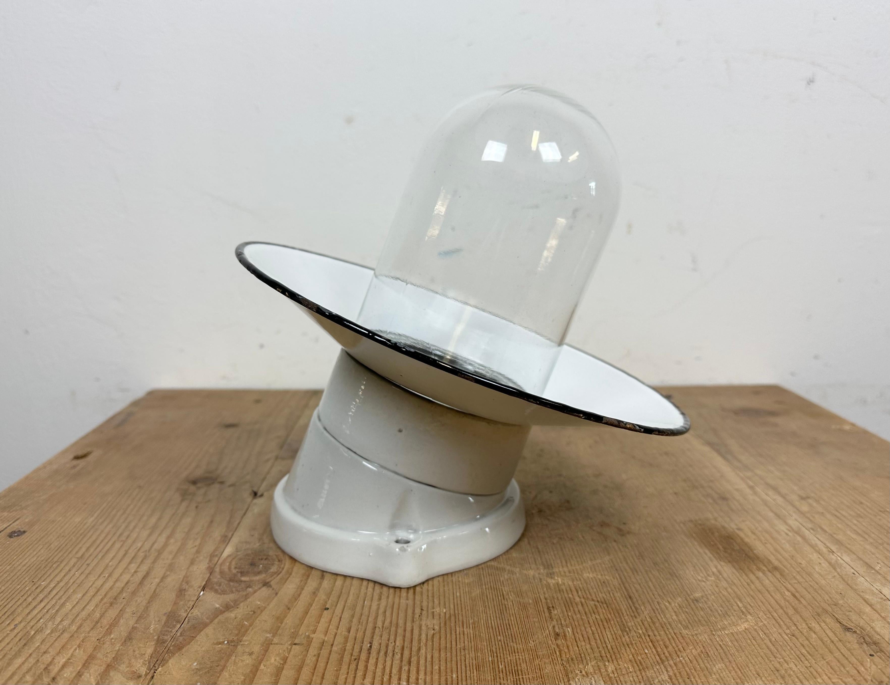 Industrial Porcelain White Enamel Wall Light with Clear Glass, 1960s In Good Condition In Kojetice, CZ