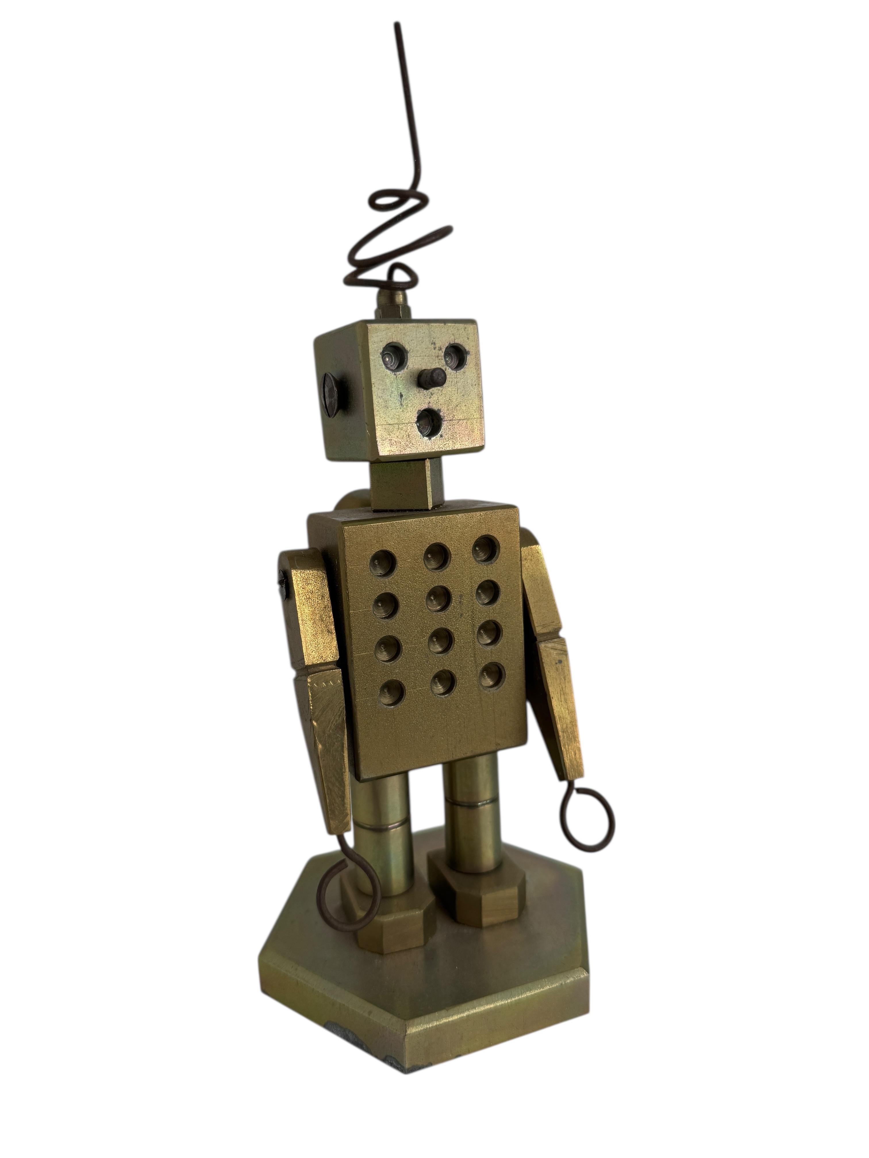 An Industrial robot made in the 1970s. This unique object was traditionally an exercise given to a novice machinist to test their knowledge and skill at operating their machine. It requires careful calculation, setup and precision operation to