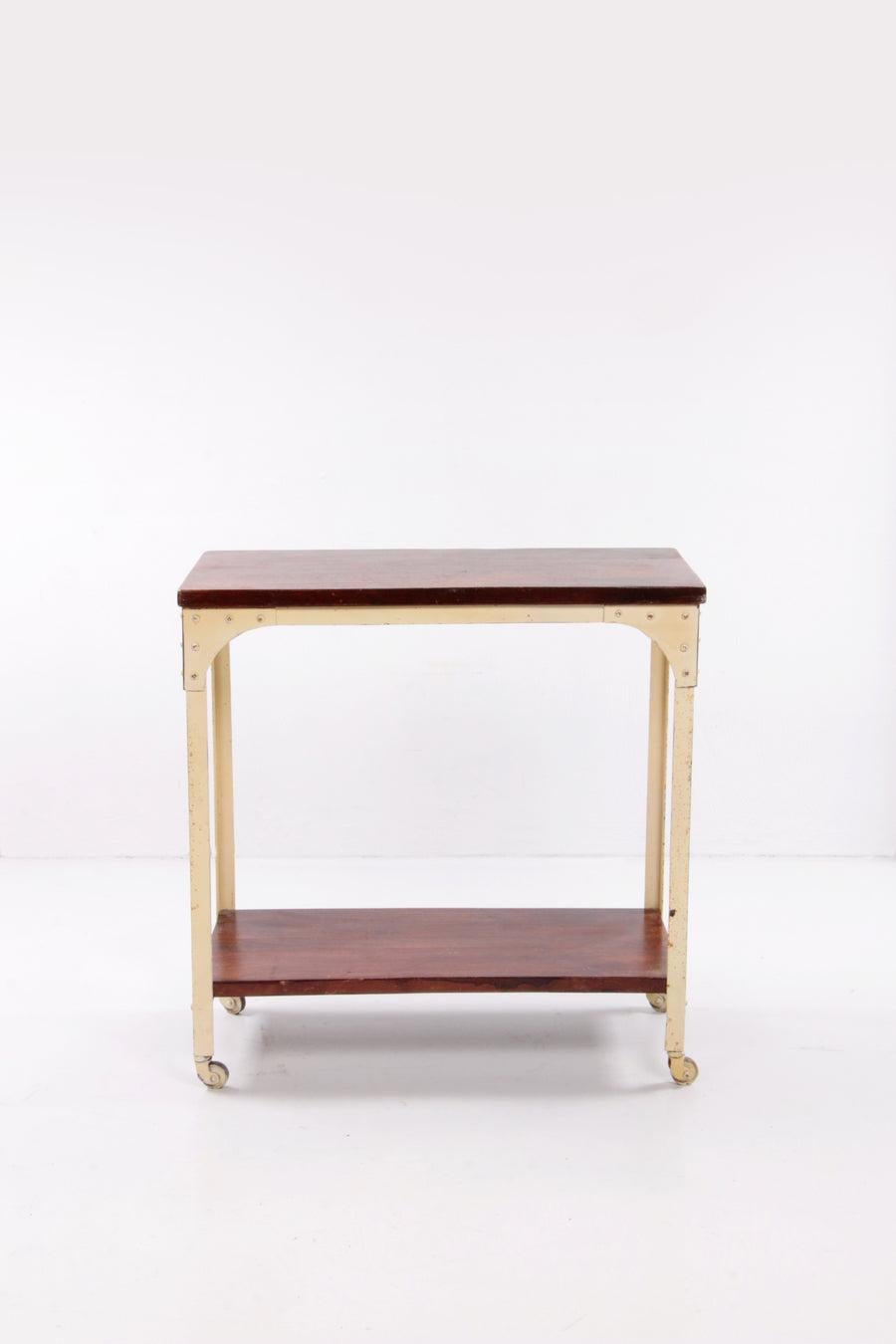 Industrial Robust Side Table Made of Wood and Metal,1970 England

This is a heavy side table or trolley, the frame is made of heavy metal and the two tops are made of wood.

Nice to place in your interior or in a bathroom.

Sustainable: