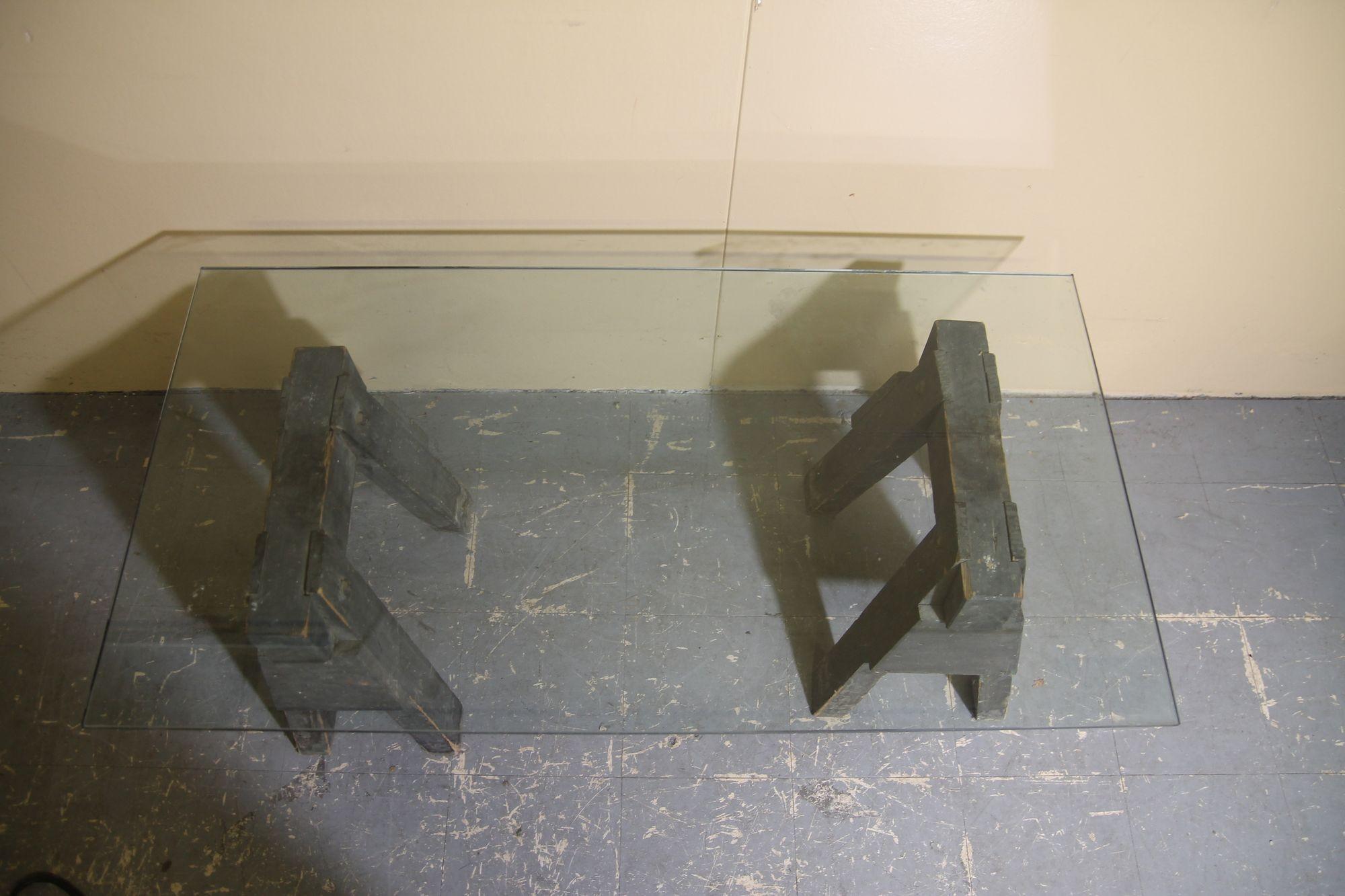 Mid-20th Century Industrial sawhorses and glass coffee table For Sale