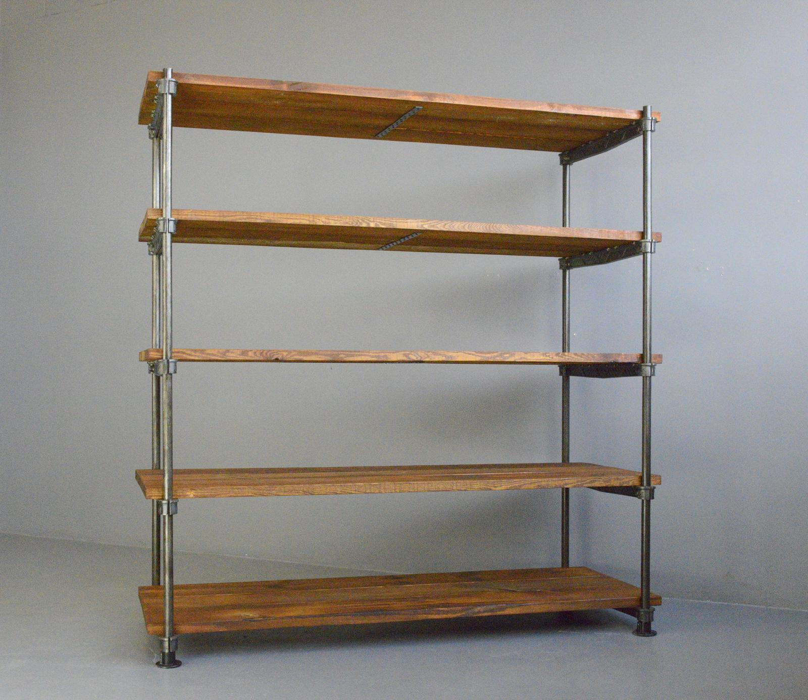 Industrial shelves by Meier & Weichelt Circa 1920s

- Cast iron brackets with Jugenstil details
- Heavy pine shelves
- Height adjustable shelves
- Shelves have been given a coat of hard wax oil 
- Produced by Meier & Weichelt, Leipzig
-