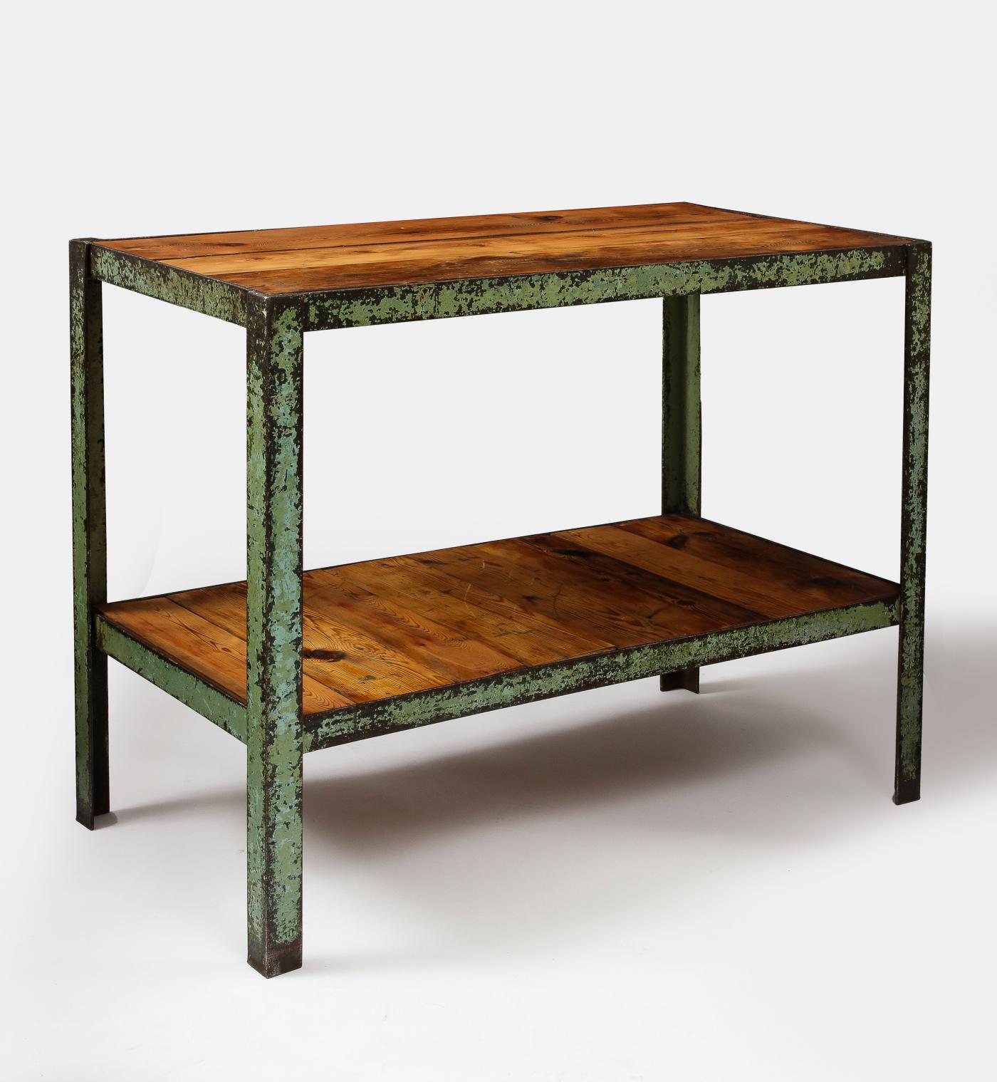 Patinated Metal and European Pine Industrial Side Table/Console with Shelf

Striking industrial shelf with traces of light green paint on the solidly welded angle iron. The wood used on the shelves is hefty, strong European pine, which will only