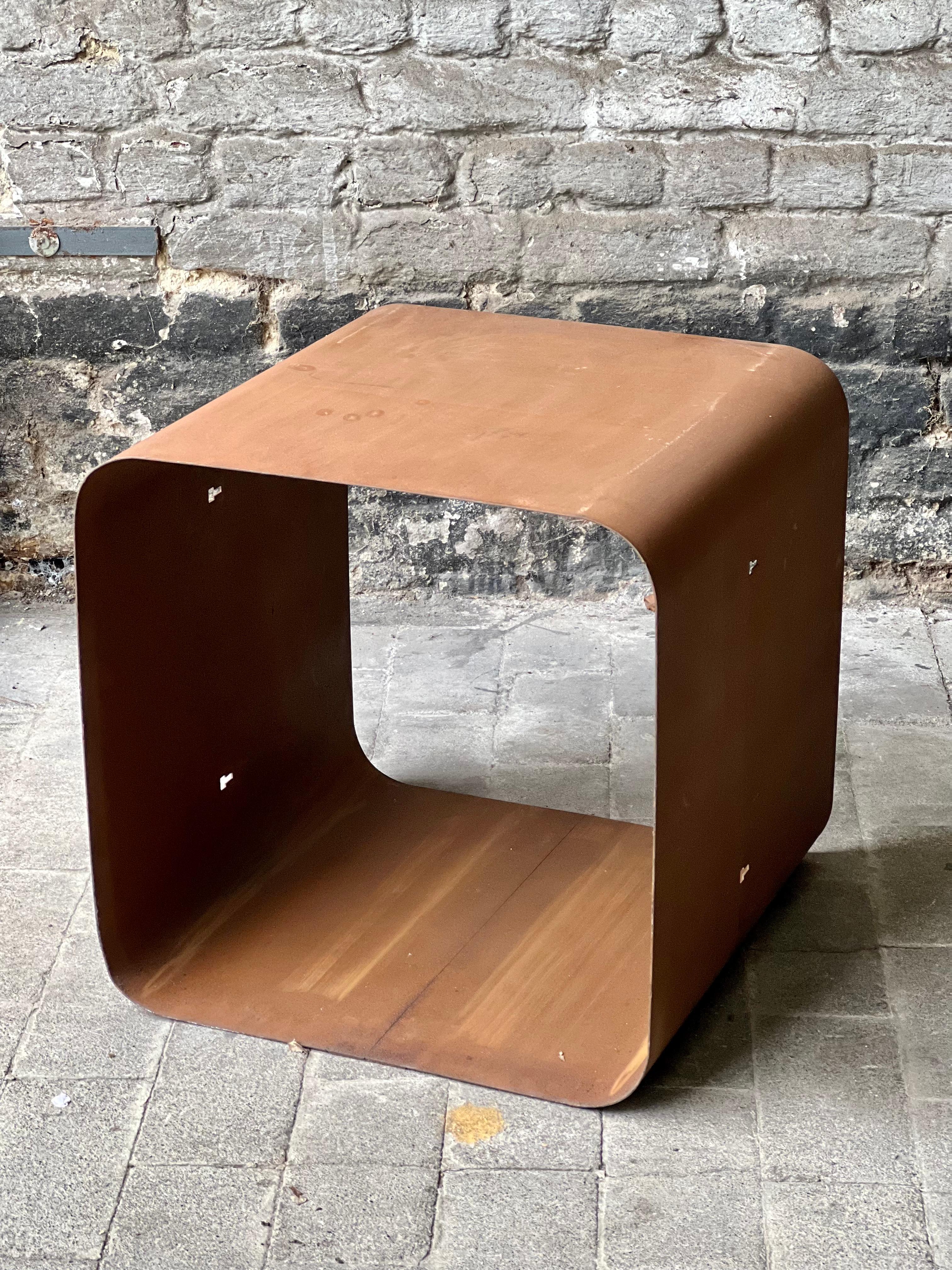 Corten steel side table or shelf. 
Geometric suspended ceiling in corten steel carefully dismantled in the CCN Building by Groupe Structures (ca. 1974) in Gare du Nord, Brussels.  Originally used as suspended ceiling, the modules seem to be perfect