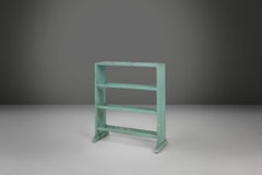 Industrial small mint-colored rack or bookcase with 4 shelves