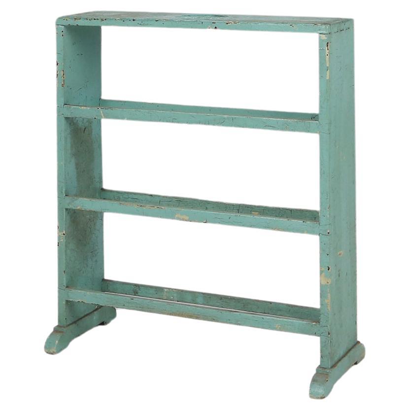 Industrial small mint-colored rack or bookcase with 4 shelves  For Sale