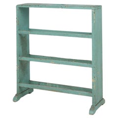Estantería o librería industrial pequeña de color menta con 4 estantes