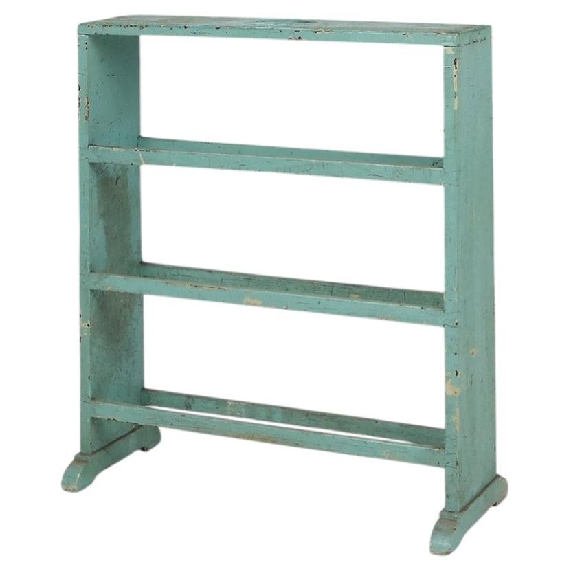 Petit porte-livres ou bibliothèque industriel de couleur menthe avec 4 étagères