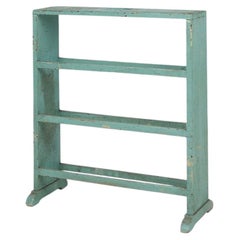 Industrial small mint-colored rack or bookcase with 4 shelves