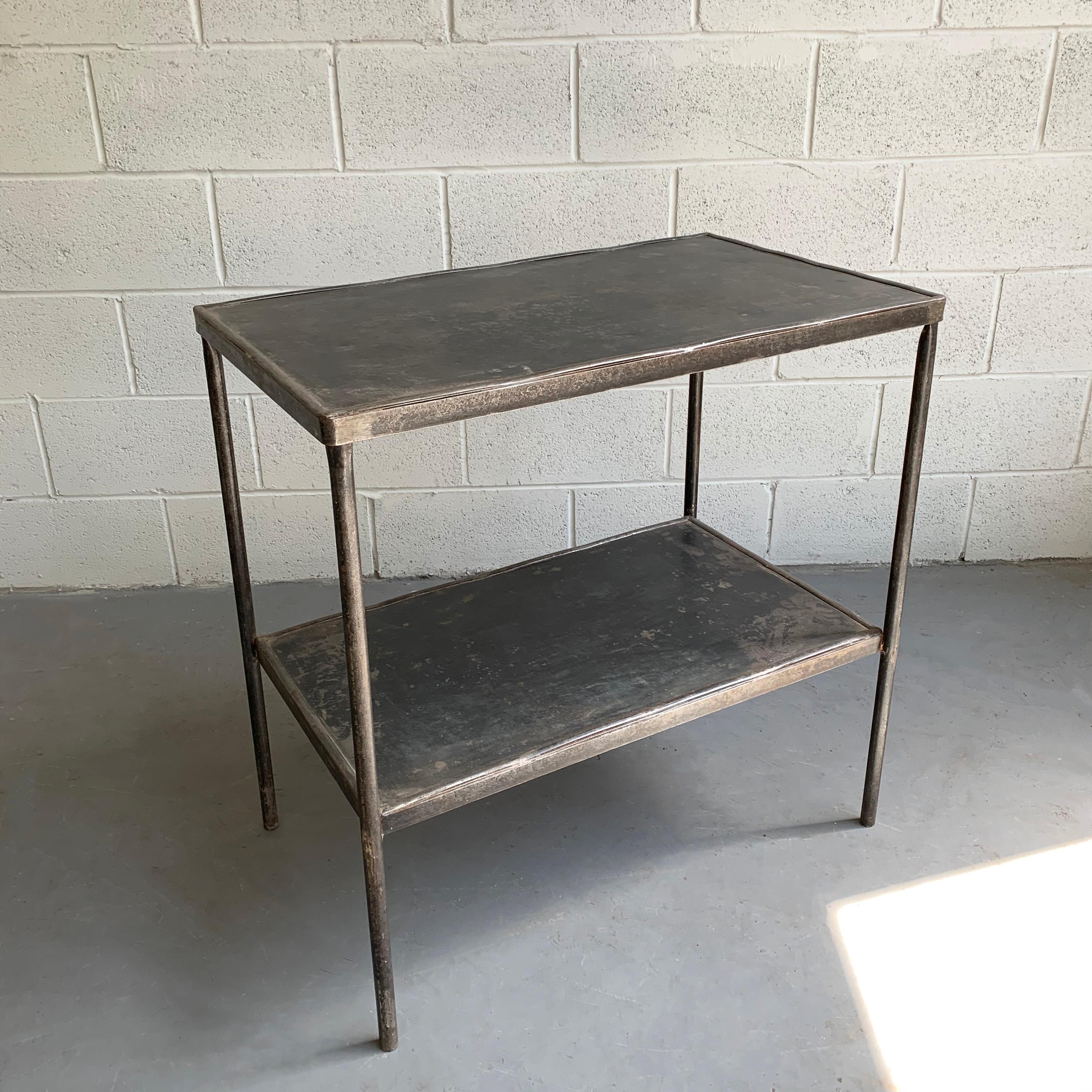 Early 20th century, industrial, brushed steel, hospital prep table features a lower tier at 13