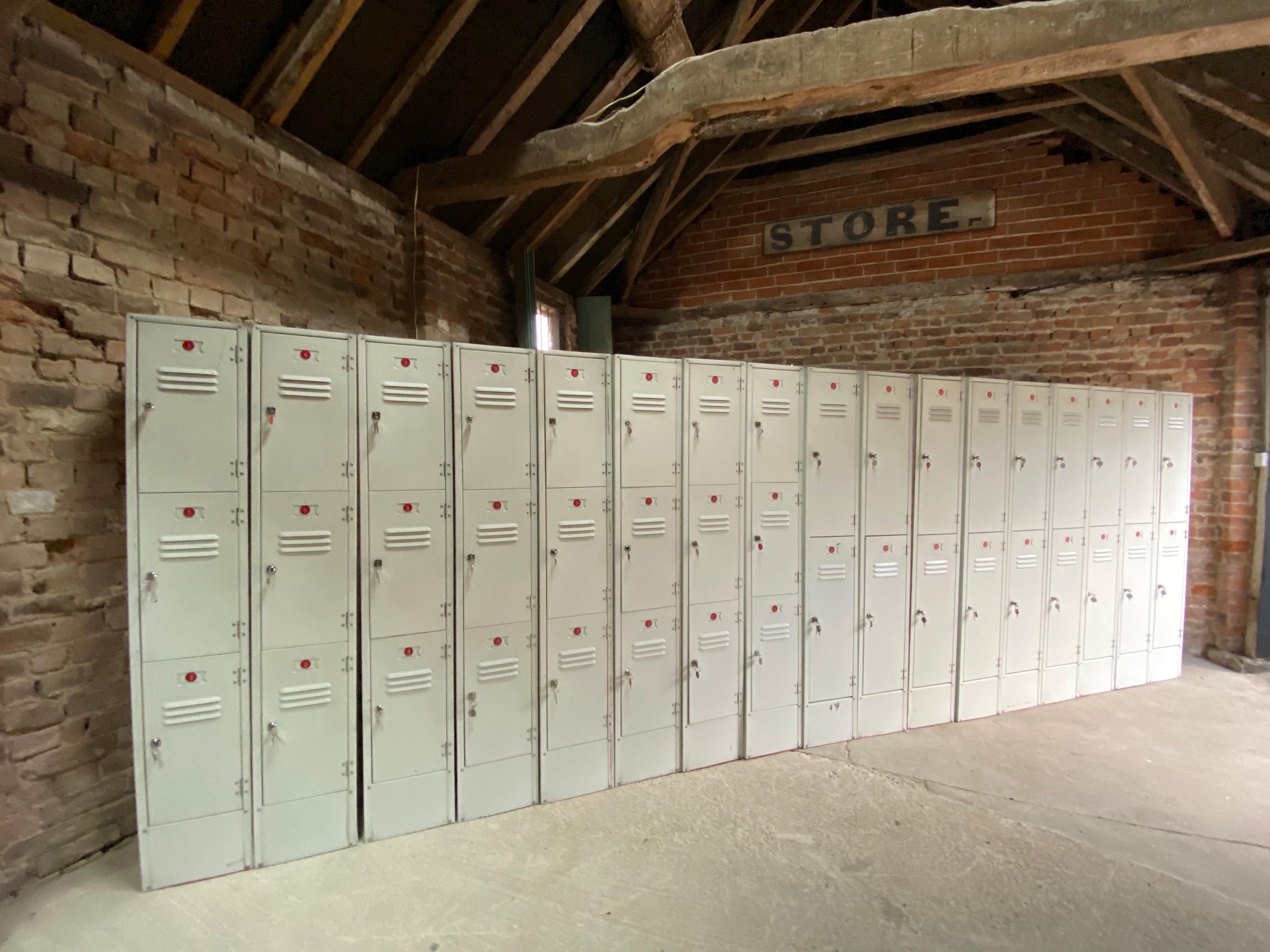 Industrial steel lockers loft style set of seventeen with forty two compartments

Industrial steel lockers comprising of 17 individual lockers with a total of 42 cabinets, each locker with lock and key, can be used individually or as a run of 17,