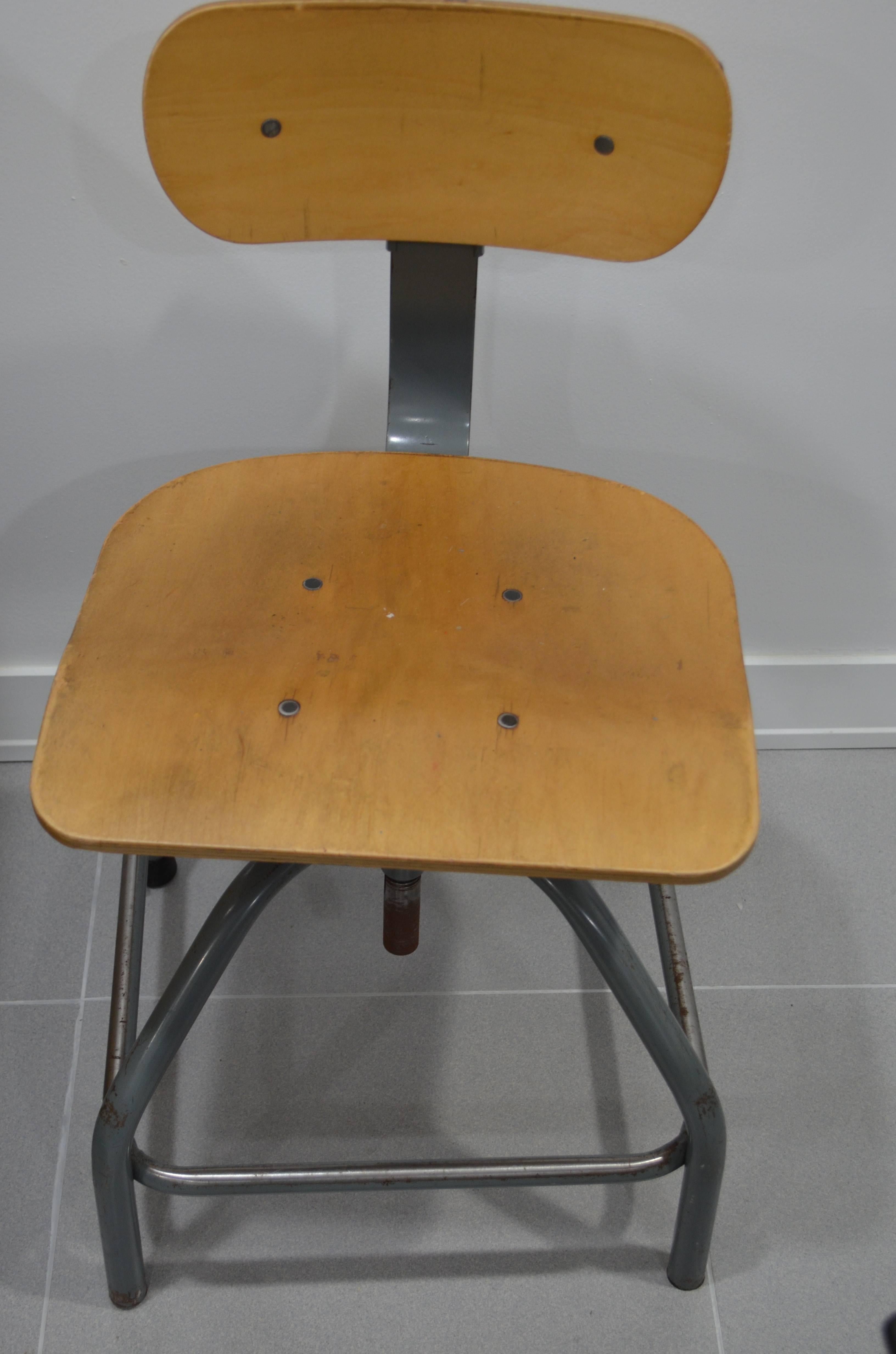 Industrial counter stool from BEVCO. Made of steel with plywood seat. Very easy to get comfortable in this stool that adjusts for height, depth to counter and support to back. And includes a steel footrest all around. 16 available.
Ships free