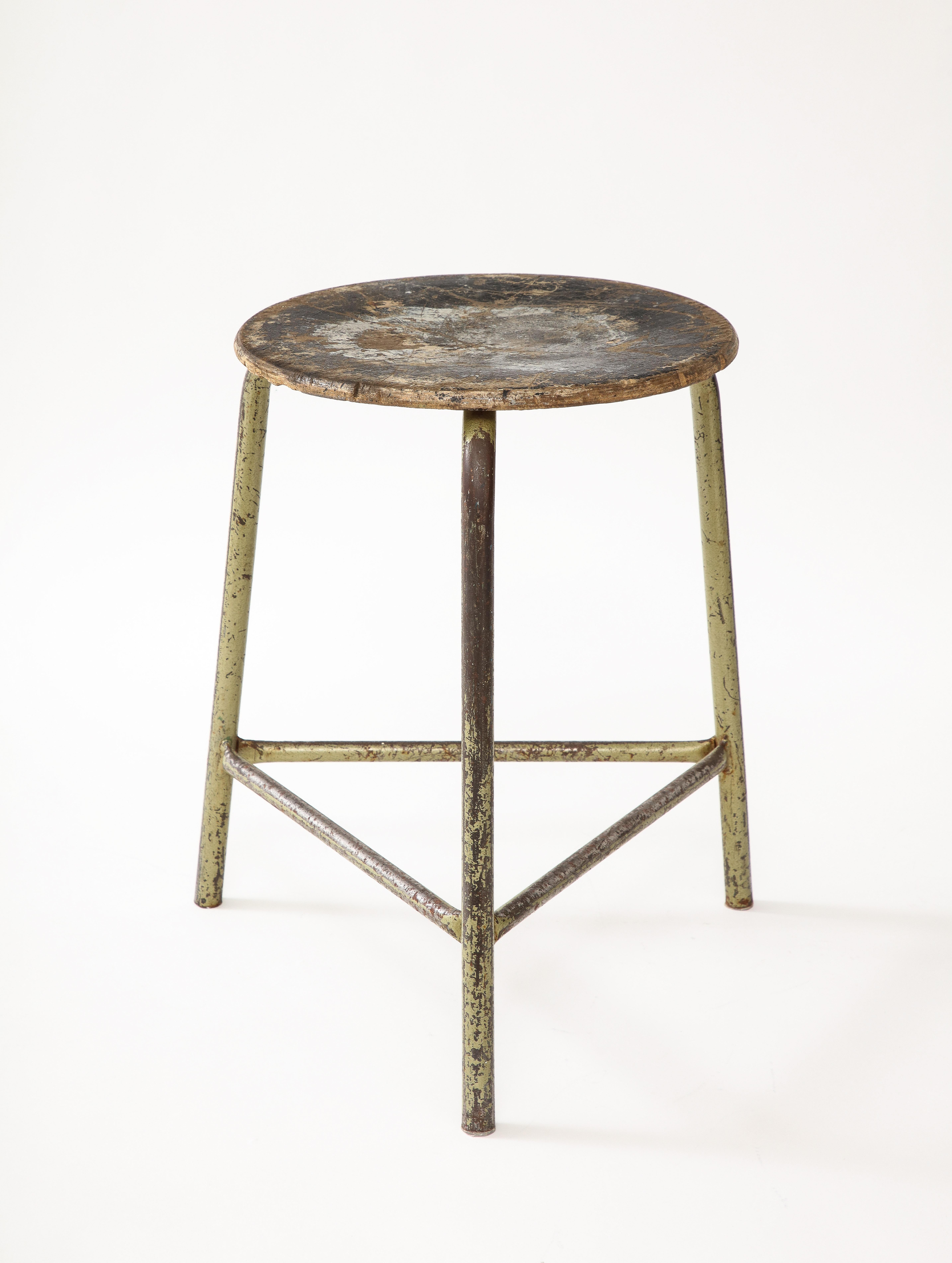 Worn, industrial French stool with lots of character.