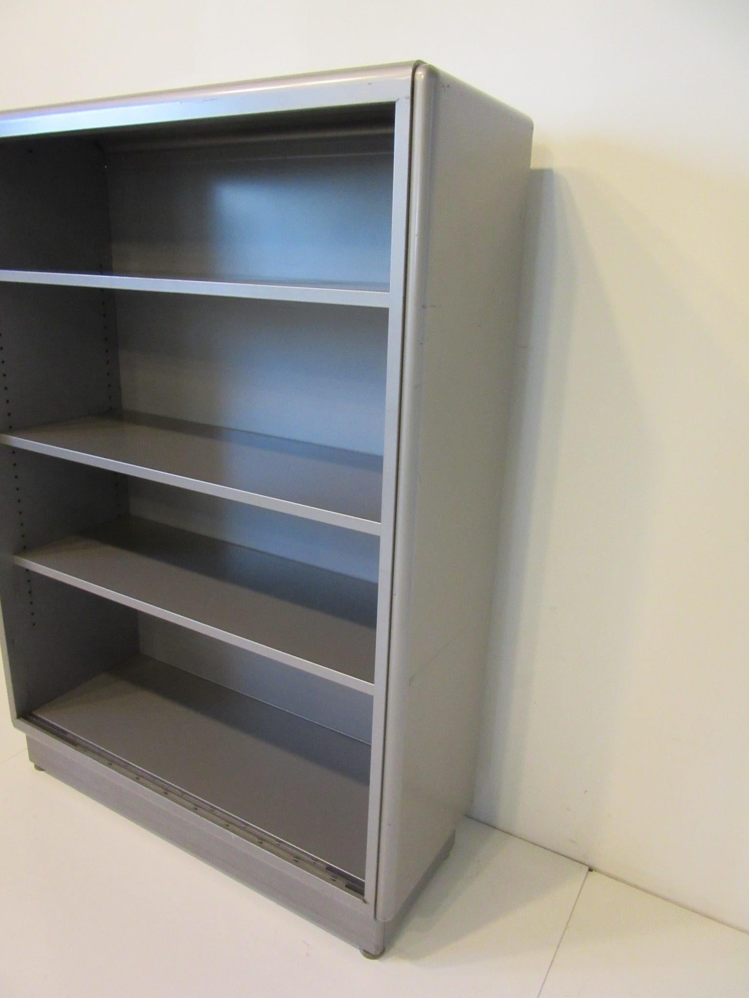 metal bookcase with glass doors