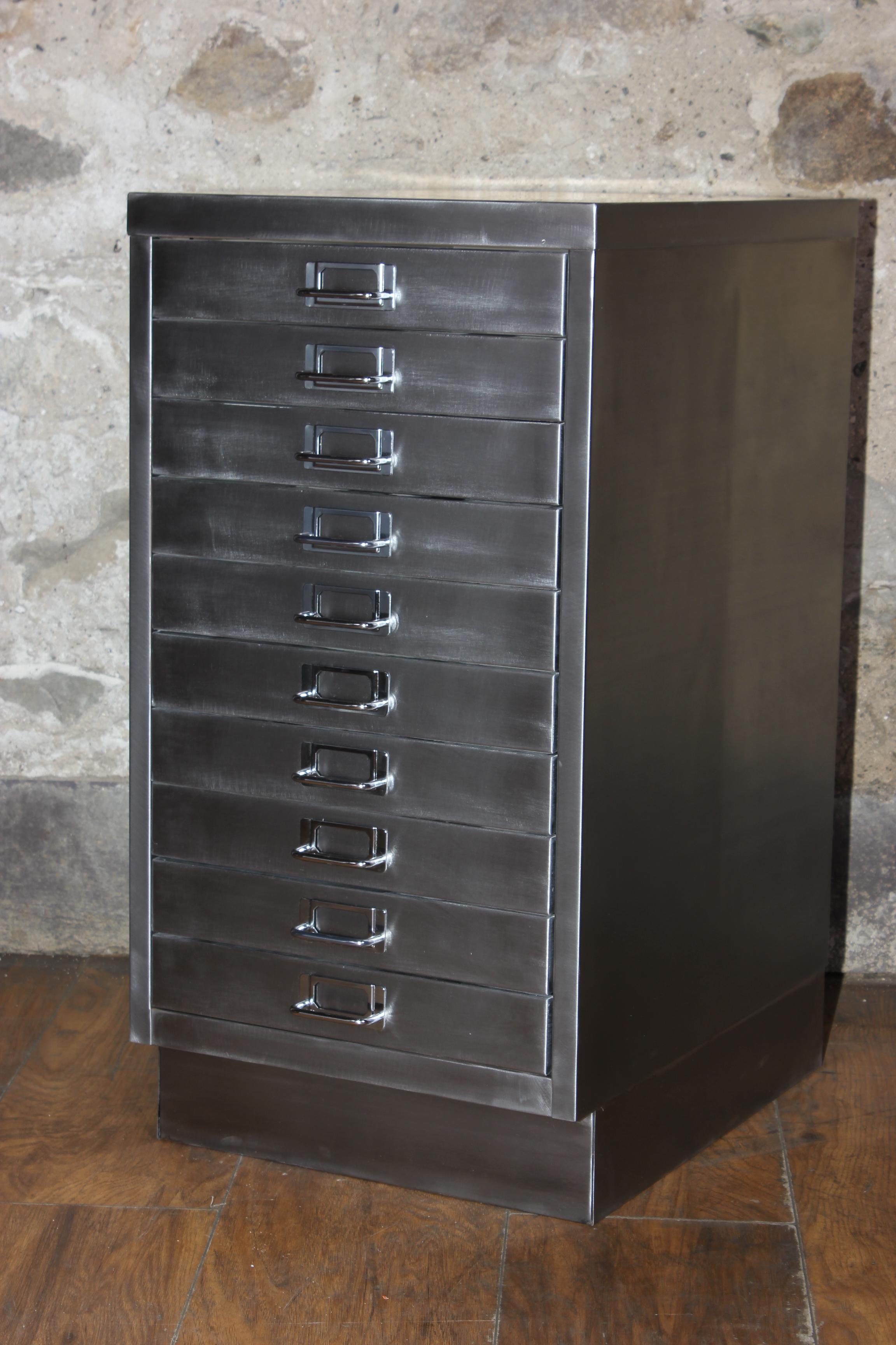 A stunning 1980s Industrial stripped metal 10-drawer filing cabinet. This impressive A3/legal size Industrial design piece has been stripped back to bare metal and was manufactured in the United Kingdom. All the drawers run smoothly and have label