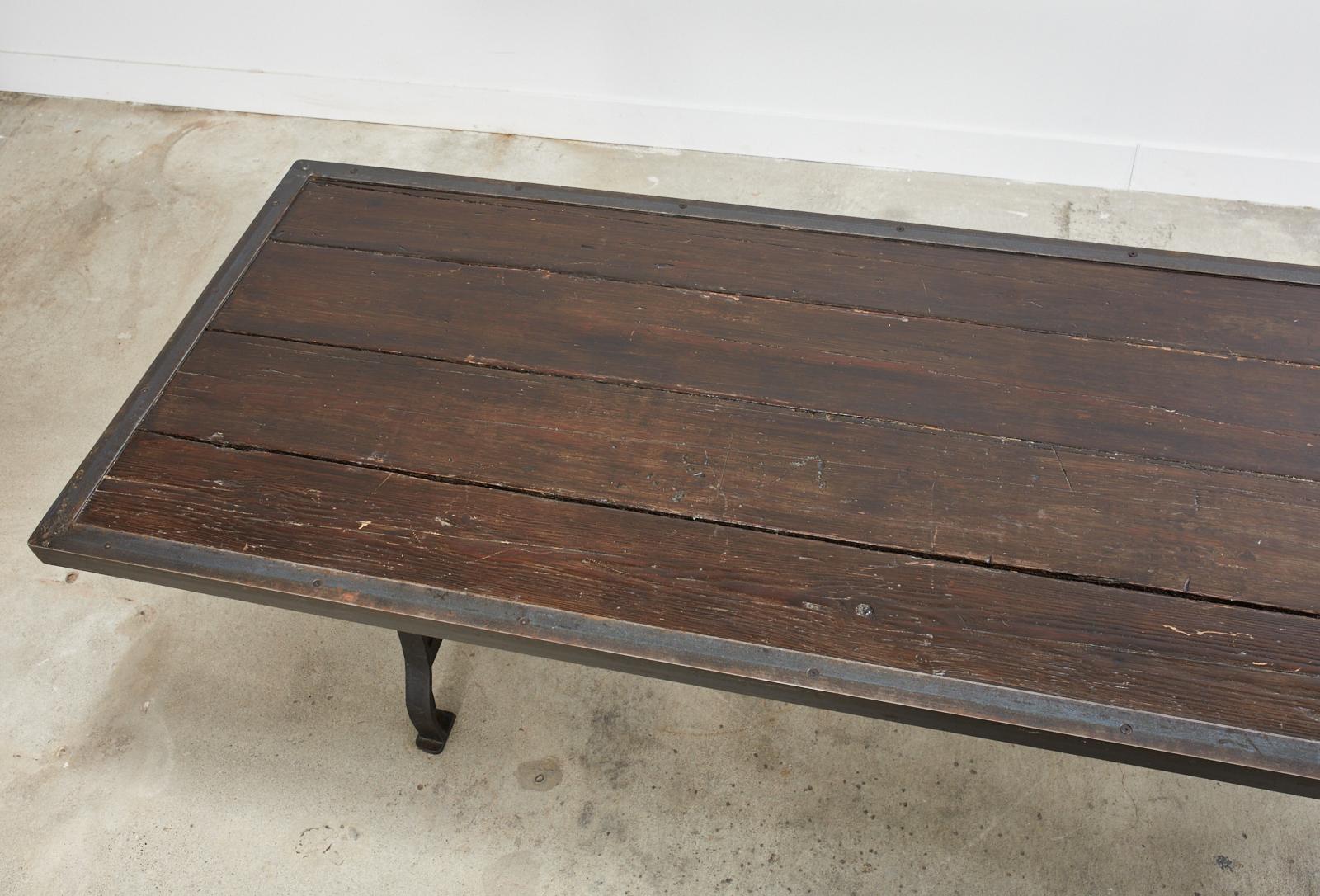 Industrial Style Cast Iron Plank Top Trestle Dining Table  In Good Condition In Rio Vista, CA