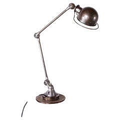 Retro Industrial style metal desk lamp with two articulated arms by Jean-Louis Domecq 