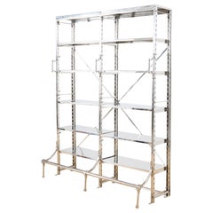 Libreria Etagere in acciaio lucido in stile industriale con gradino