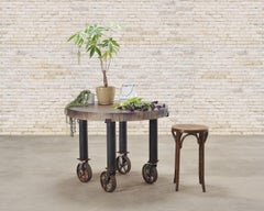 Industrial Style Round Machined Iron Center Table on Casters