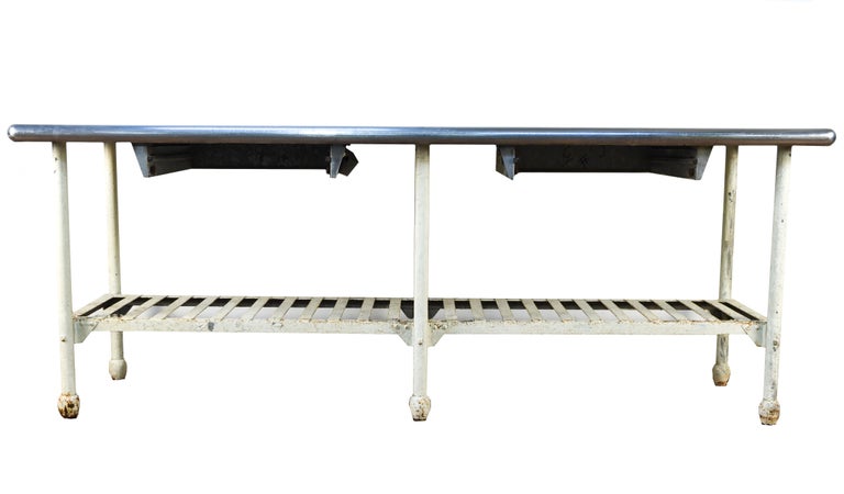 This Industrial table would bring a hip feel to a room as a console or kitchen counter.