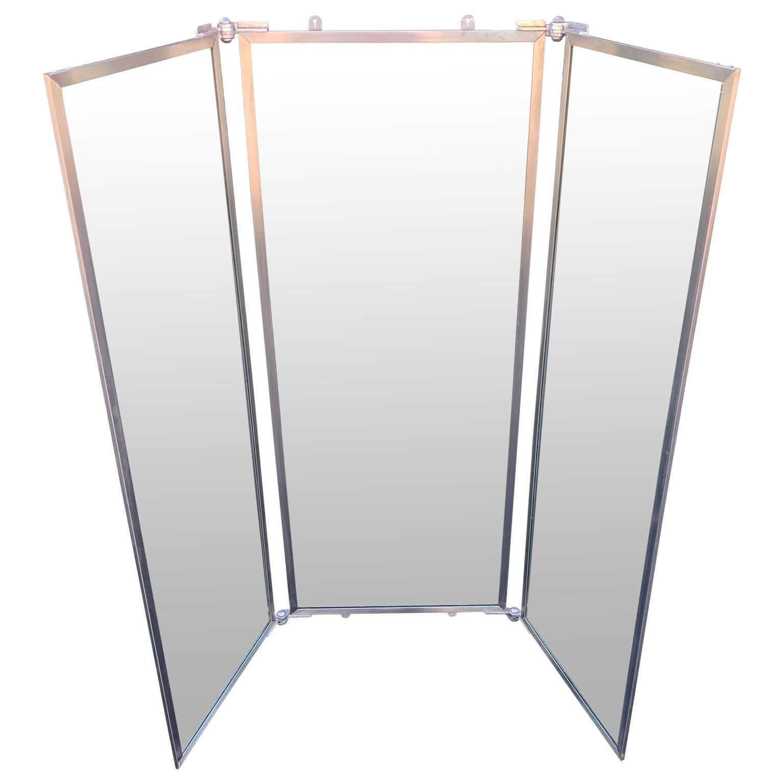 Industrial three-panel mirror and metal folding screen.

Screen measures 22 inches in depth when in horseshoe shape position
Each panel measures 20.2 inches in width and 60.2 inches in height
Screen measures 49 inches in width when in half open
