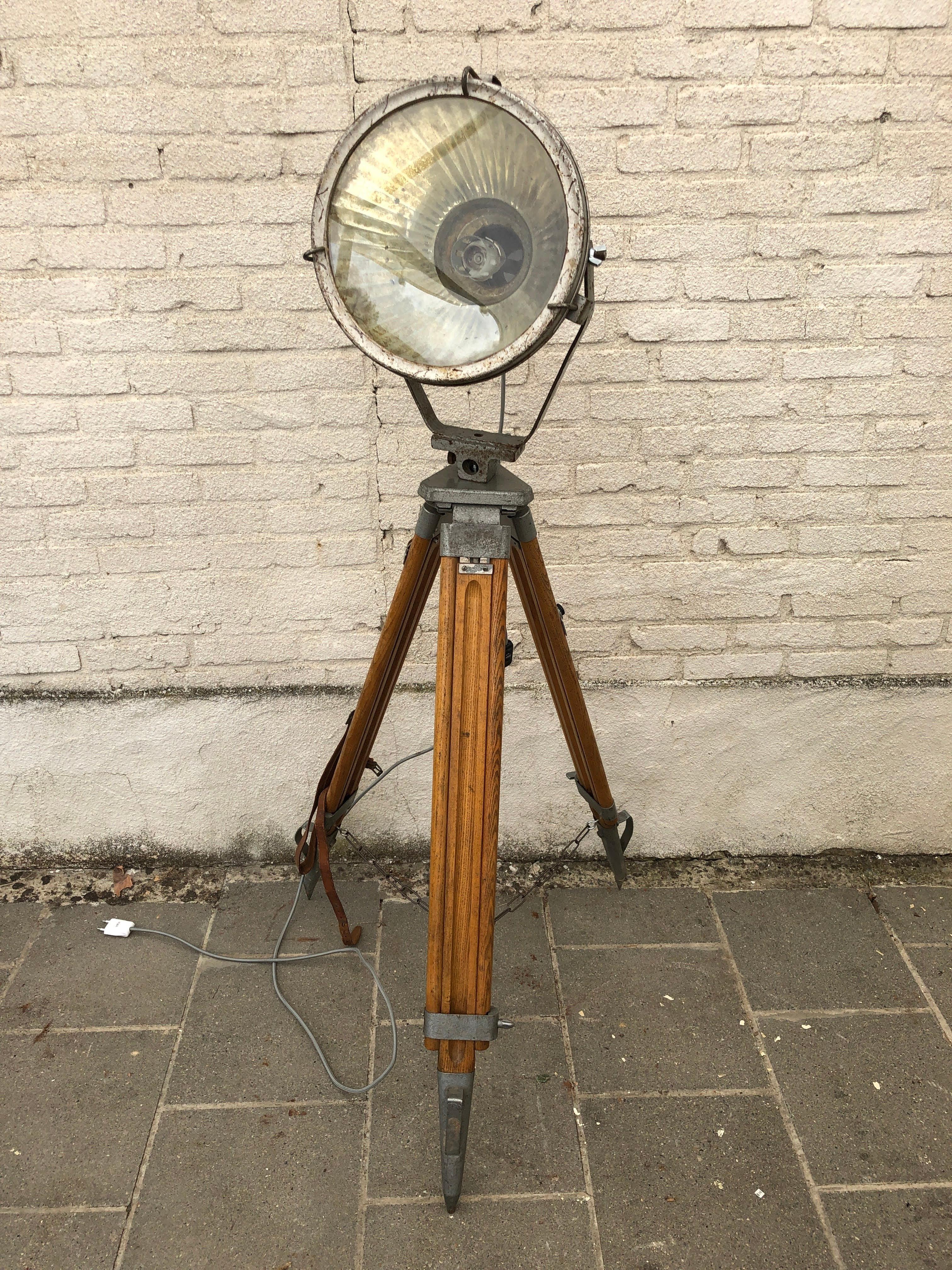 The tripod is Russian and equipped with a chain for extra rigidity of the legs.

The base is extendable so that the total height of the lamp can be 190cm/74.08