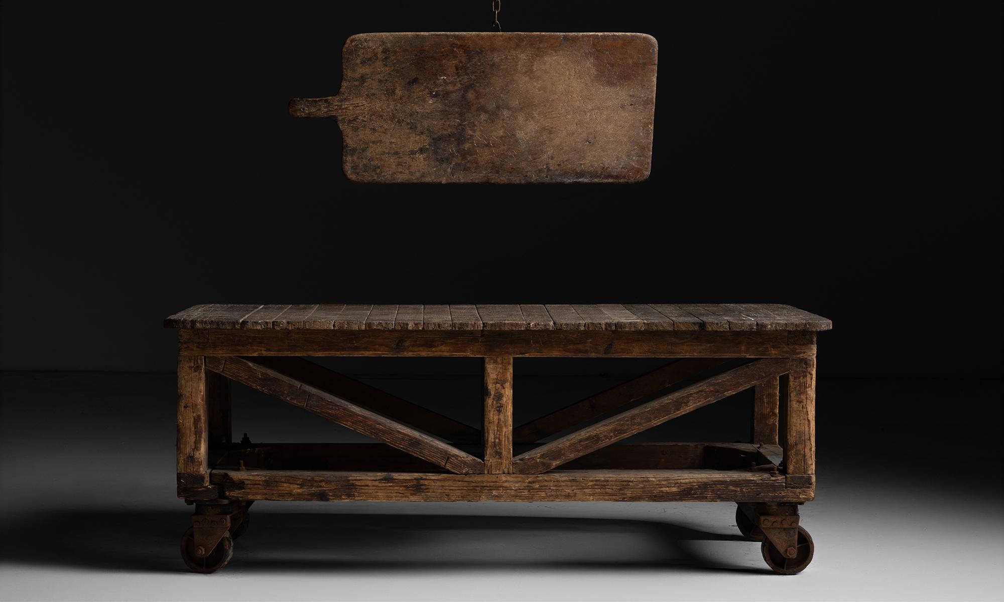 England circa 1930

Slatted oak top on pine base with industrial castors.

62.75”L x 29.75”d x 24.5”h