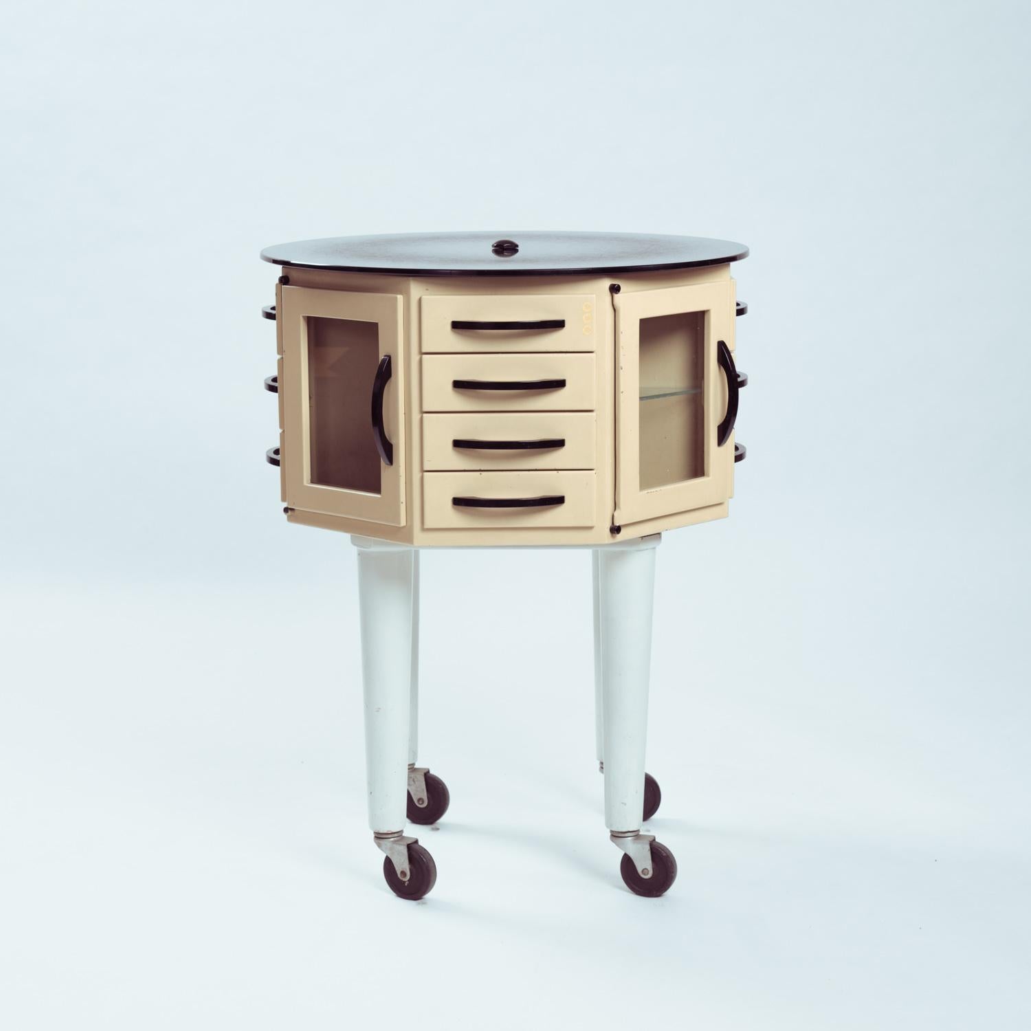 Industrial steel glass turnable dental showcase cabinet, France, 1950s For Sale 1