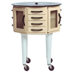 Industrial steel glass turnable dental showcase cabinet, France, 1950s
