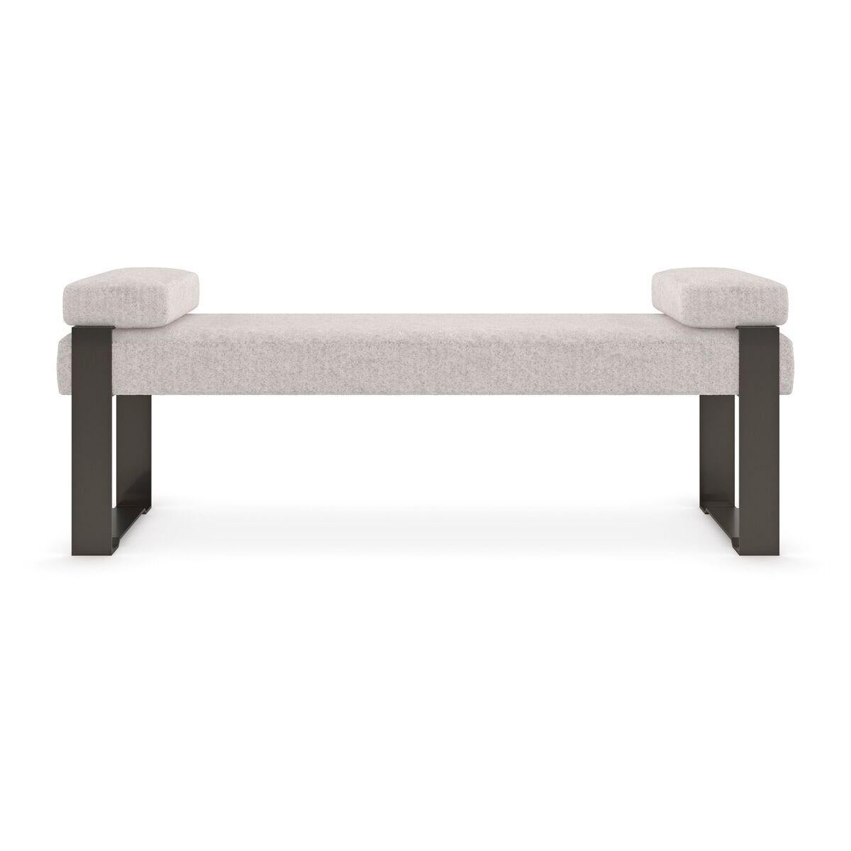 With an architecturally inspired frame, this streamlined bench juxtaposes the industrial aesthetic of Brushed Deep Bronze metal and a plush taupe velvet. With embedded magnets to keep them in place, side pillows add comfort and keep the look clean.