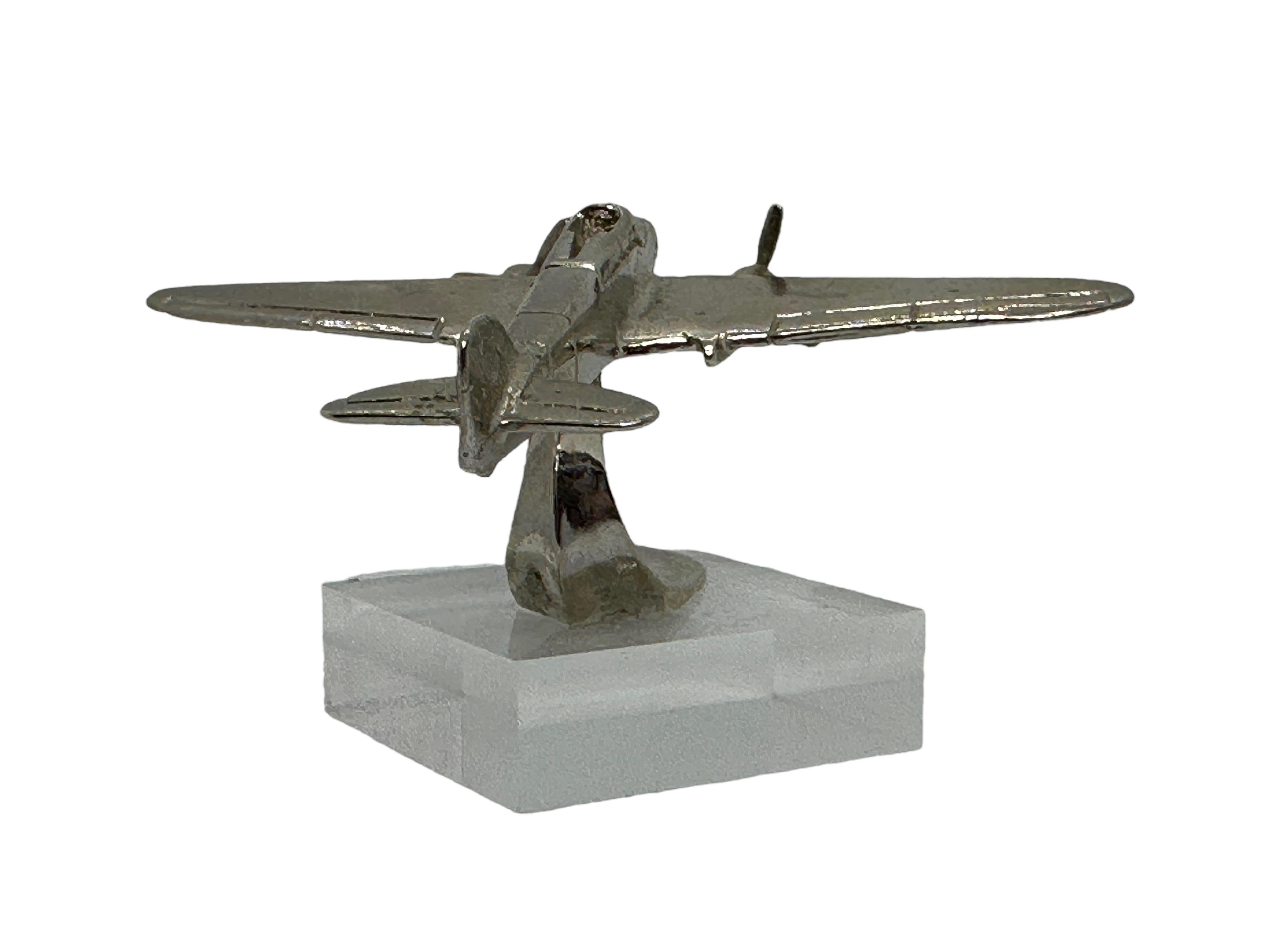 An Industrial plane model made in the 1980s. This unique object is made of metal and has a chrome finish. A nice Industrial sculpture for displaying them on a cupboard, credenza or desk. Also a nice addition to any collection.