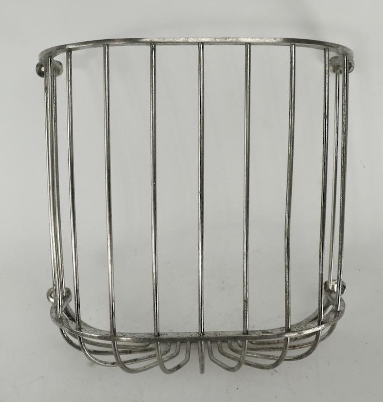 Nickel plate over brass cage frame construction turn of the century wall mount towel, or face cloth bin. This item was most probably found in an early 20th century. Barber shop. It is of commercial grade material, design and construction. No breaks,