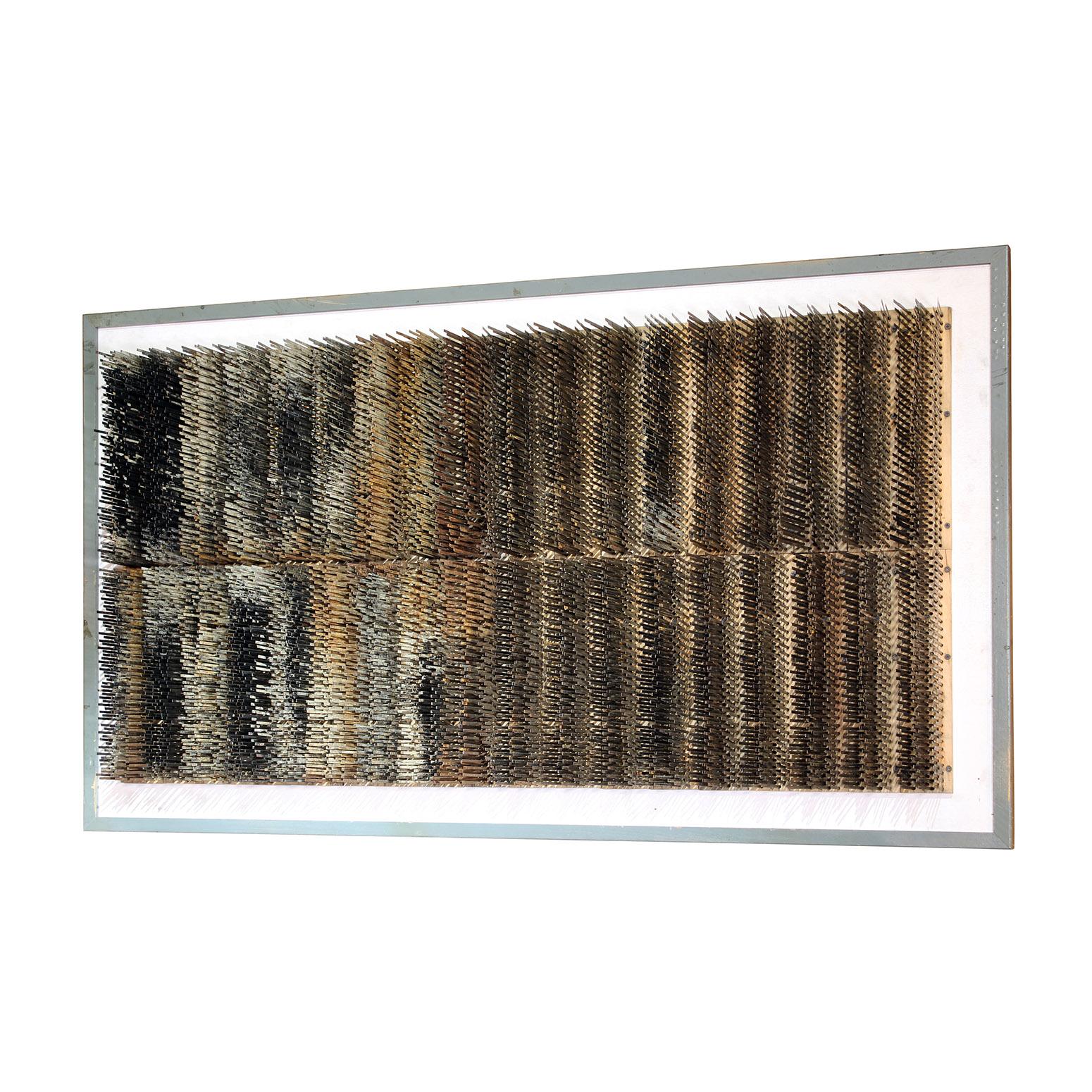 Industrial wall art sculpture. Turn of the century steel factory conveyor brushes on wooden frame. Measures: 64 1/4