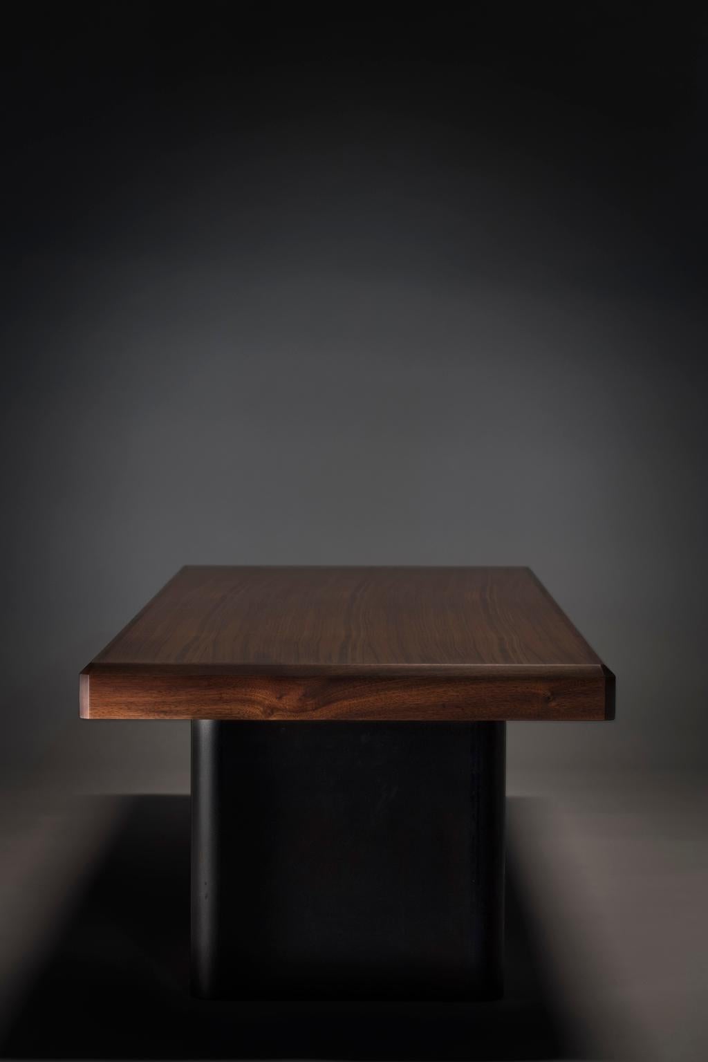 Collection I: Bridge table

A refined, chamfered walnut top rests upon a robust steel architectural foundation, creating a bridge like expression of structure and span.

Dimensions:
56” L x 19.5” W x 13” H

Made to order.
 