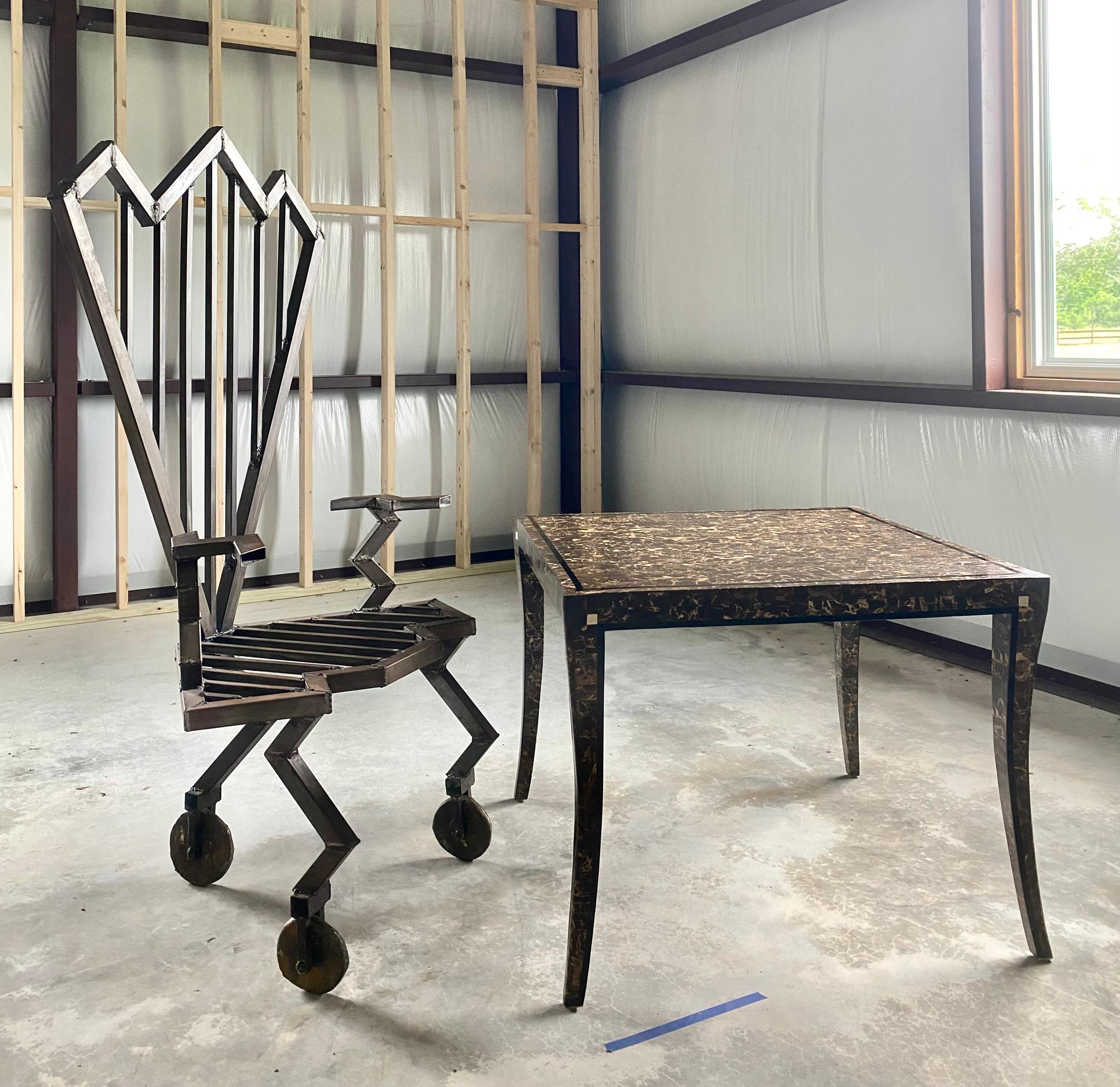 This one of a kind piece has been custom made to stand out and be noticed. Solid and sturdy, with a presence like none other, this feels like sculpture in a space and cannot be ignored. The sharp angles and grand scale give this piece stature,