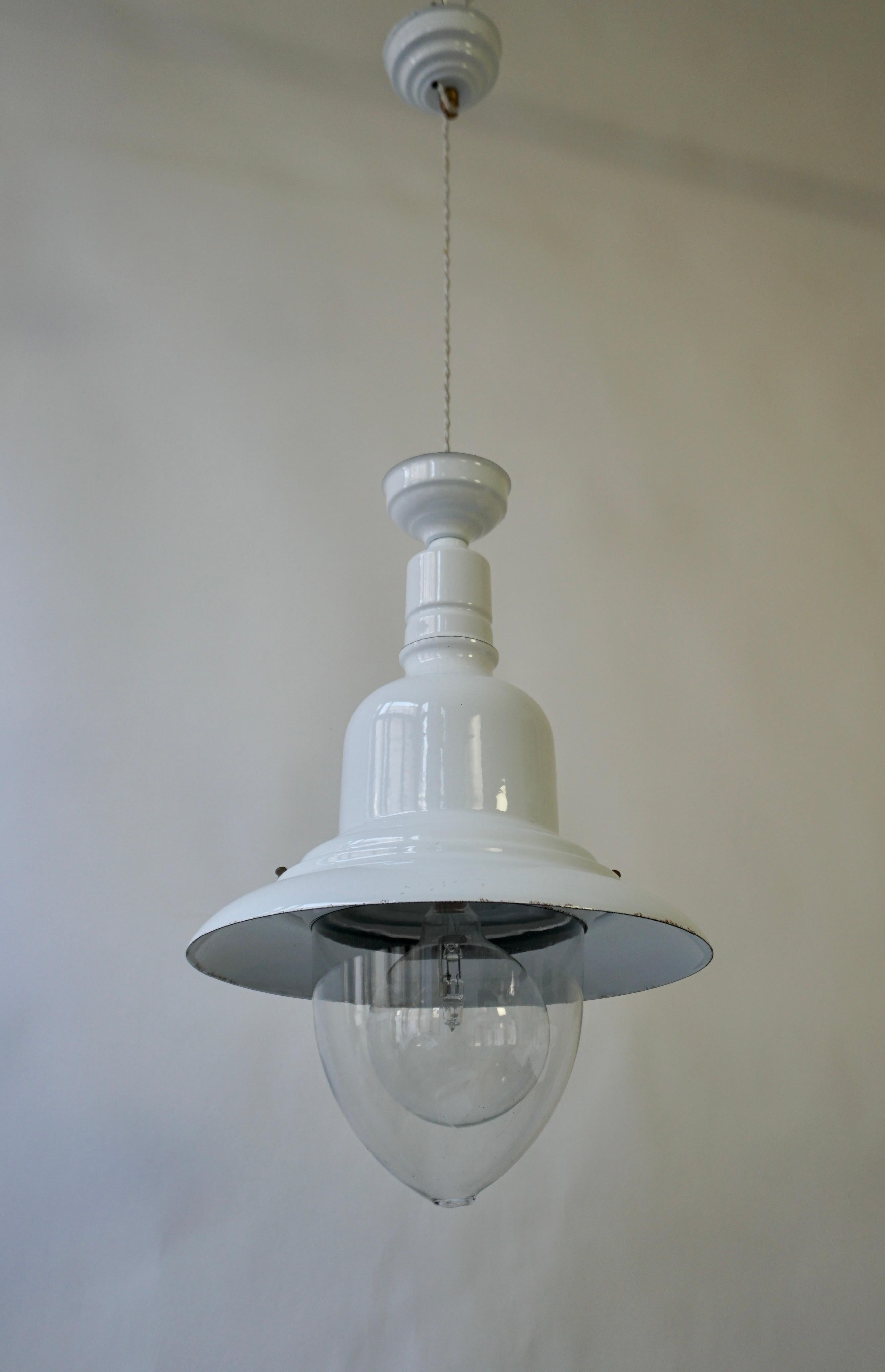 Timeless white-colored (enameled) industrial design fishing lamp.

This quality fixture is inspired by the centuries-old practice of fishermen hanging lanterns on the back of their boats to attract fish at night.

Dimensions;
Diameter 14.1