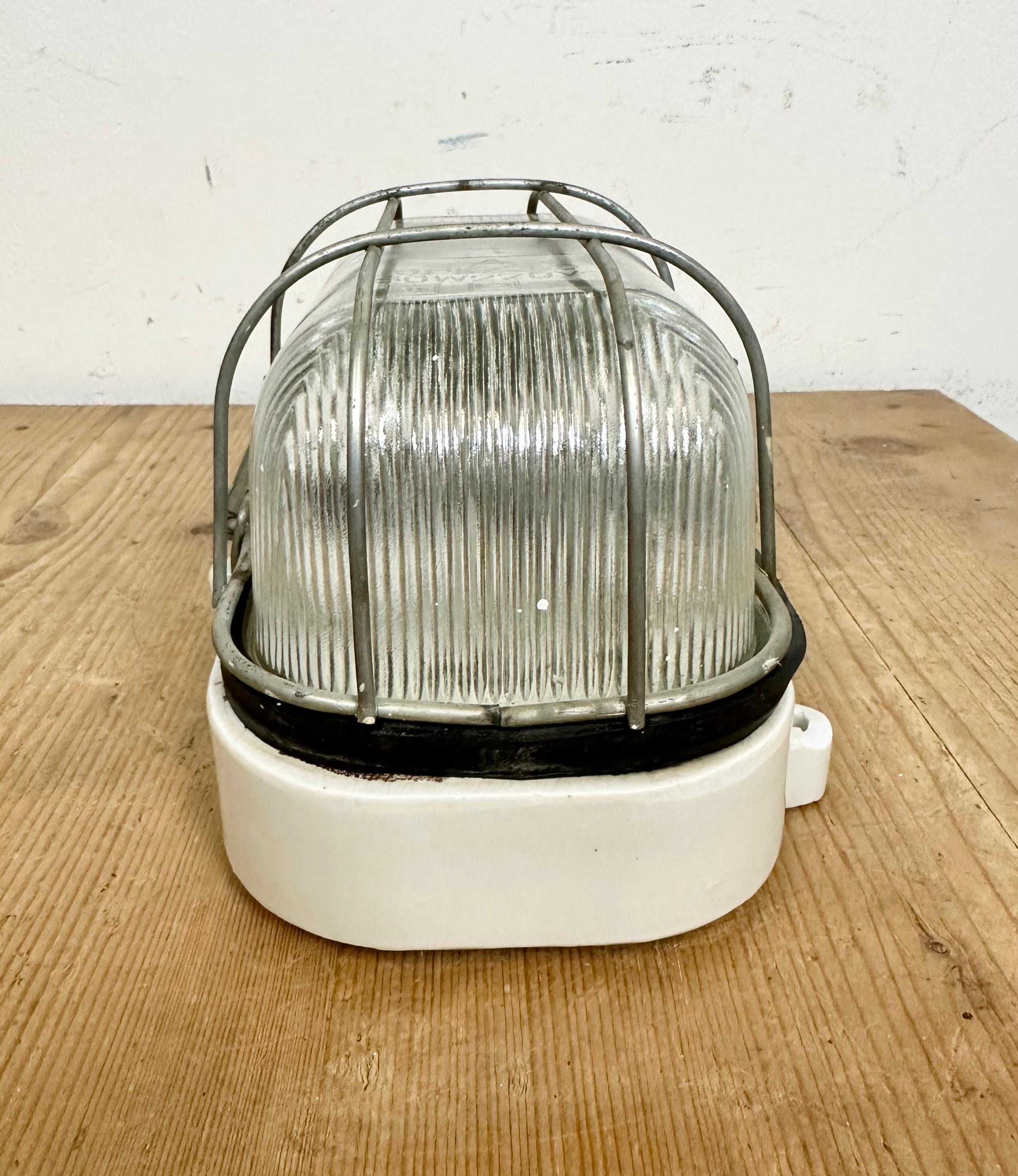 Late 20th Century Industrial White Porcelain Cage Wall Light with Ribbed Glass, 1970s For Sale