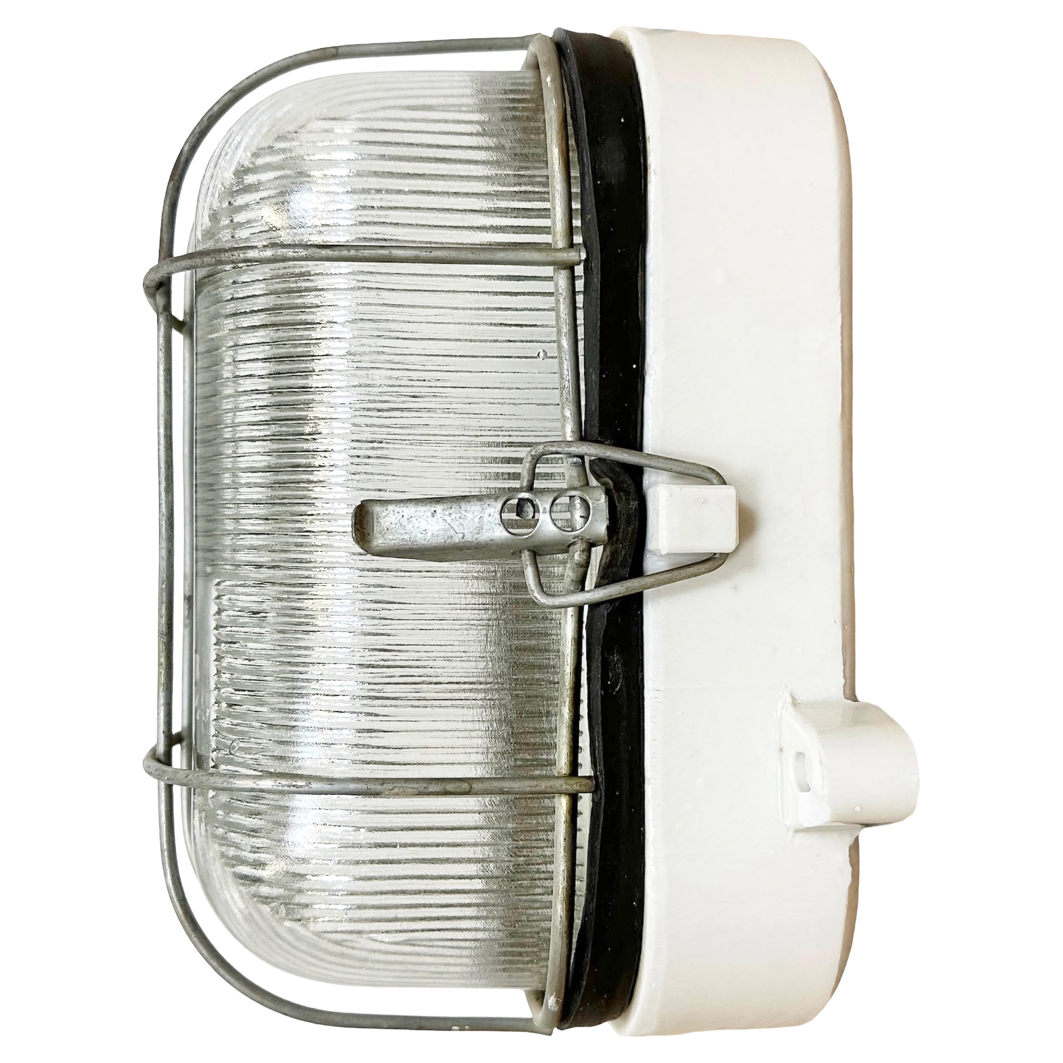 Industrial White Porcelain Cage Wall Light with Ribbed Glass, 1970s For Sale