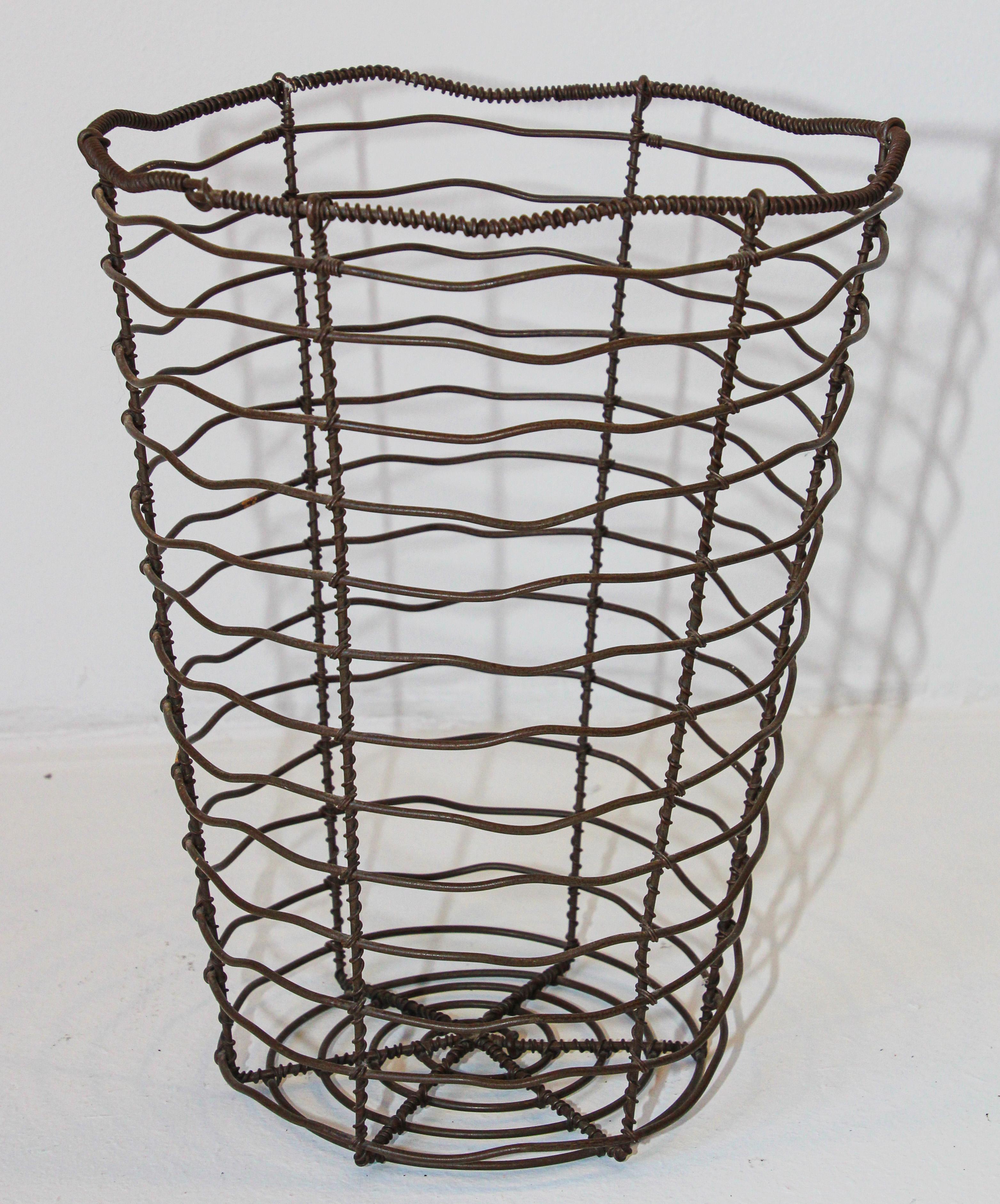 Vintage industrial inspired wire basket. 
Handcrafted from galvanized steel Inspired by the baskets originally used by farmers and fishermen.
Industrial design inspired by vintage Swedish Korbo baskets.
Made from galvanized steel to withstand