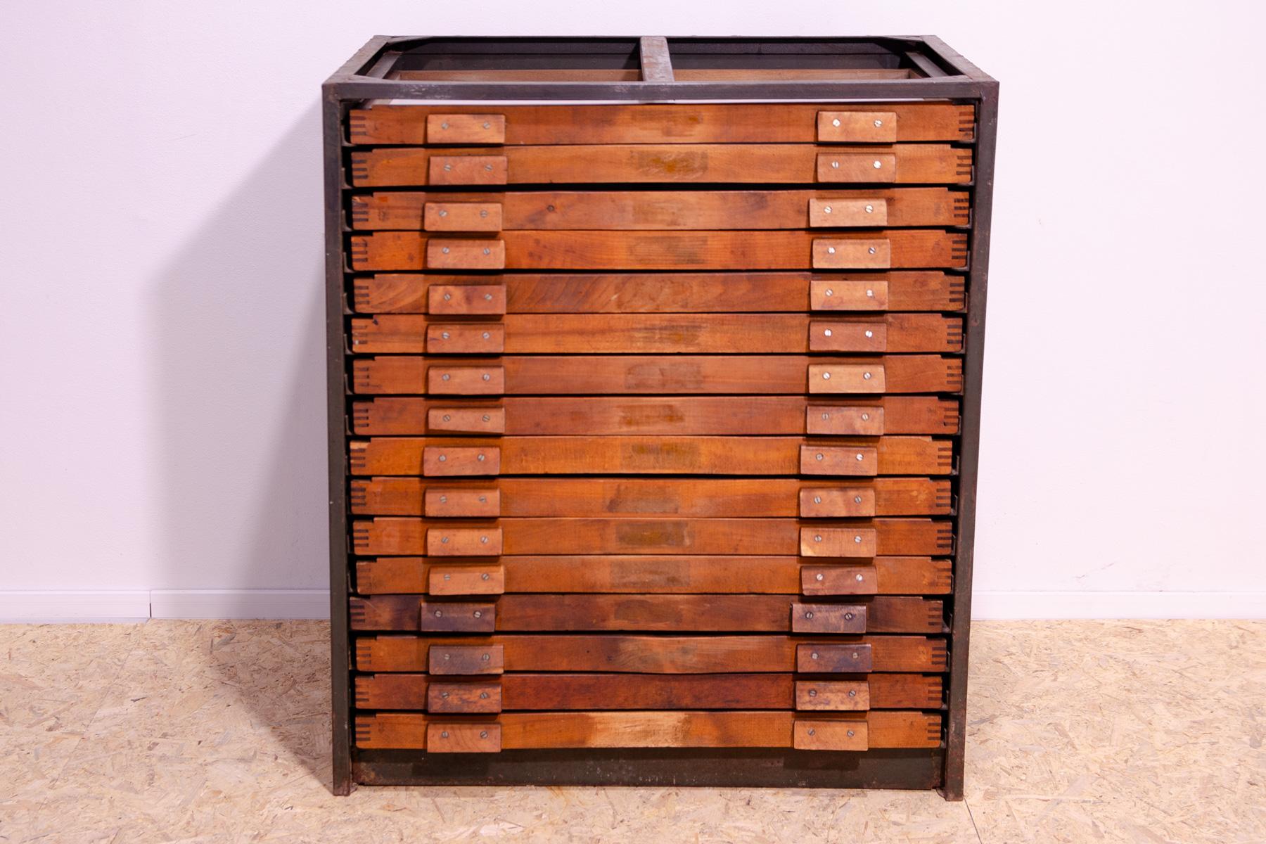 This industrial chest of drawers was made in the former Czechoslovakia in the 1970´s

This chest can be used perfectly as a work cabinet for example for an architect, for a the drawings, or even for craftsmen.
It´s made of iron and wood. There are