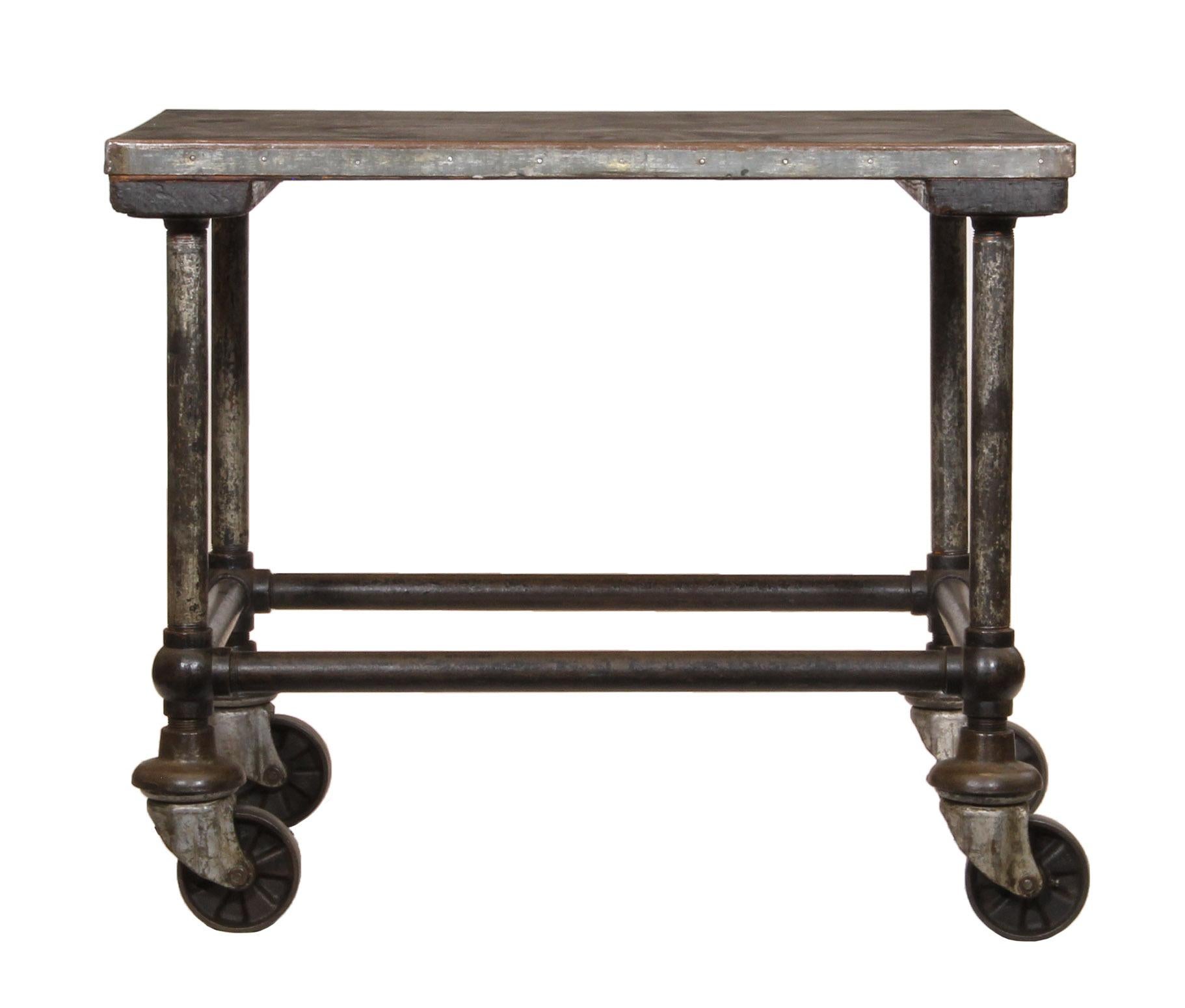 Vintage industrial low steel top cart/table.