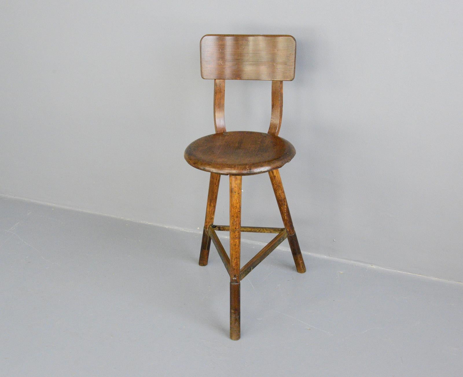 Industrial work stool by Ama, circa 1920s

- Solid elm seat 
- Bentwood beech back
- Designed by Albert Menger
- Produced by Ama, Nordhalben
- German ~ 1920s
- 39cm wide x 43cm deep x 92cm tall
- 62cm seat height

Condition