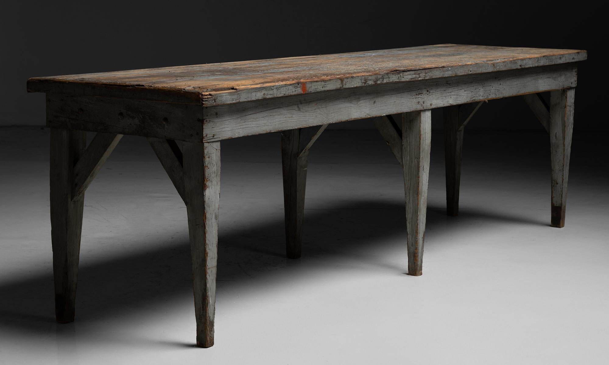 Industrial Work Table

America circa 1930

Weathered painted surface with six legs and angled support beams.

118”L x 31.5”d x 34.75”h