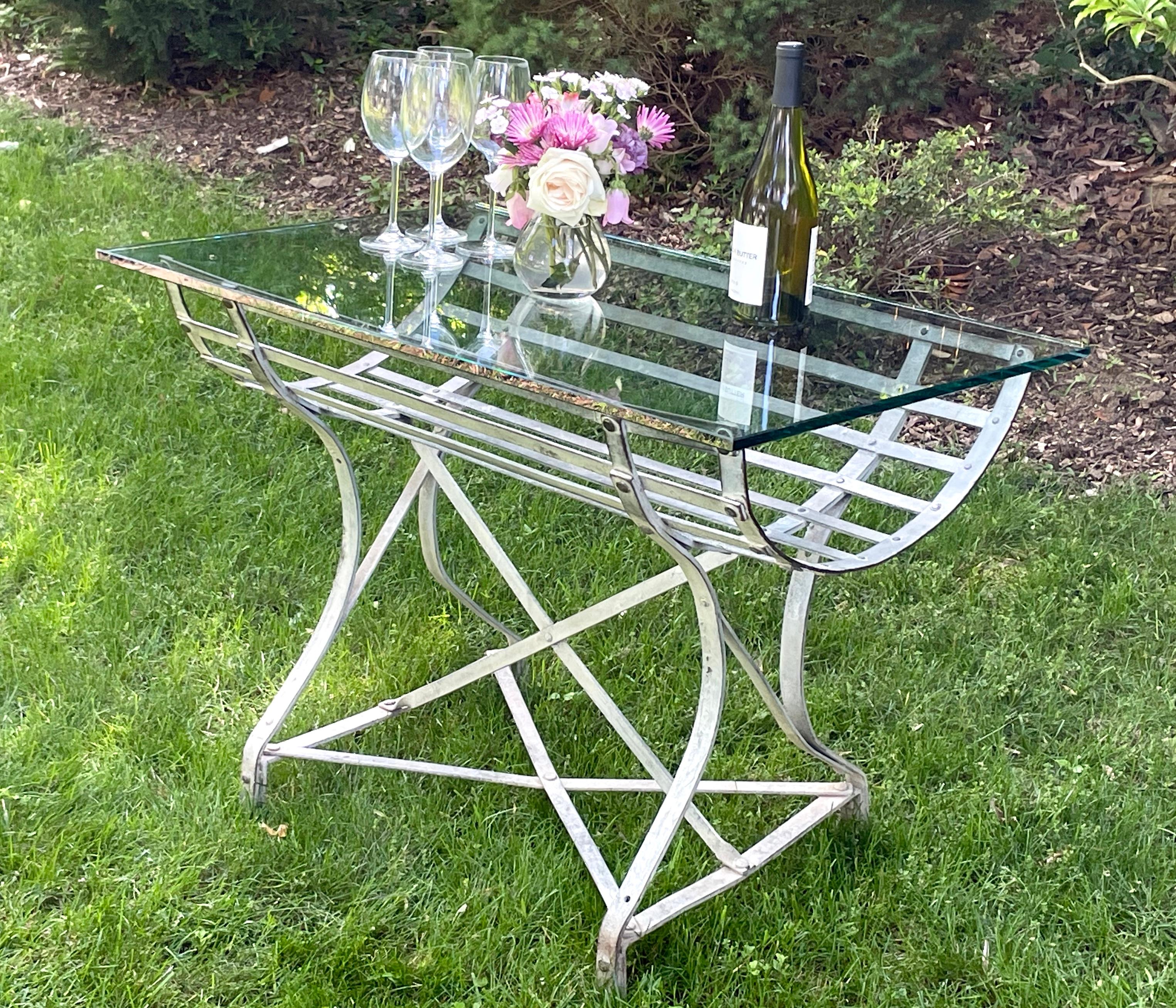 Industrial zinc table. French sculptural galvanized steel keg or cask stand converted into a table. An industrial metal rack great as a table with beautiful zinc finish. France, 20th century. 
Dimension: 32.75