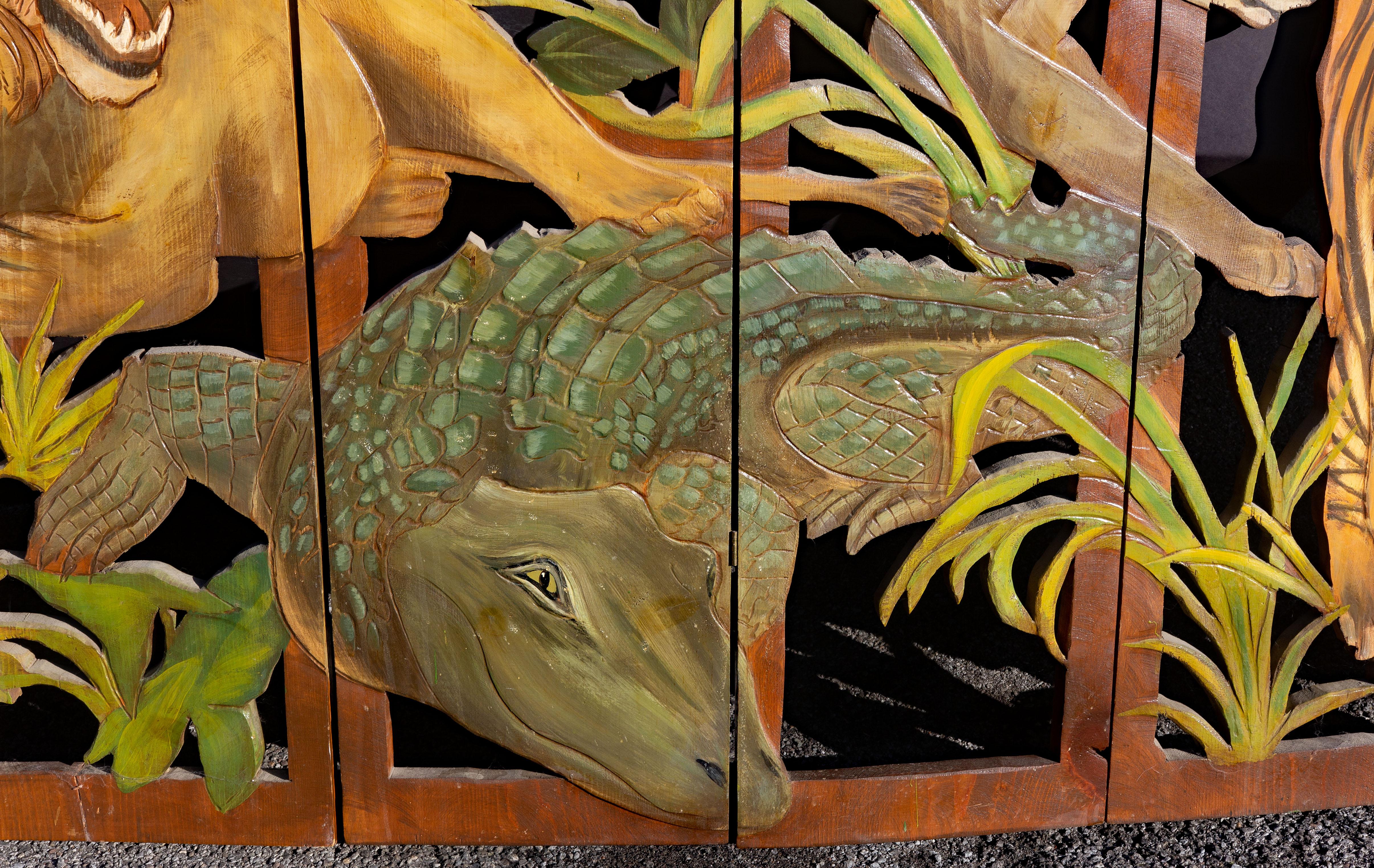 Exotic African jungle screen. Hand painted and carved solid wood panels. Signed Ines Smrz. Dated 1986. Shipping as low as $350. Contact Joseph Dasta Antiques for a quote.