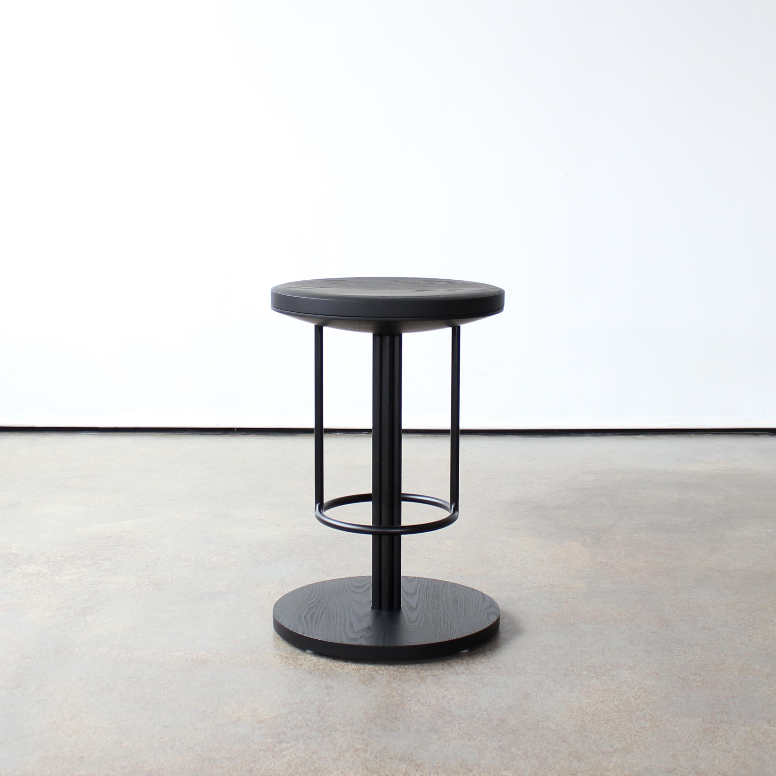 Inez Counter stool by Crump and Kwash 

Carved, solid wood seat, base, and under cap / hand rubbed oil finish / solid steel construction / durable powder coat finish / 360 degree rotating seat top

Customizations available. 


