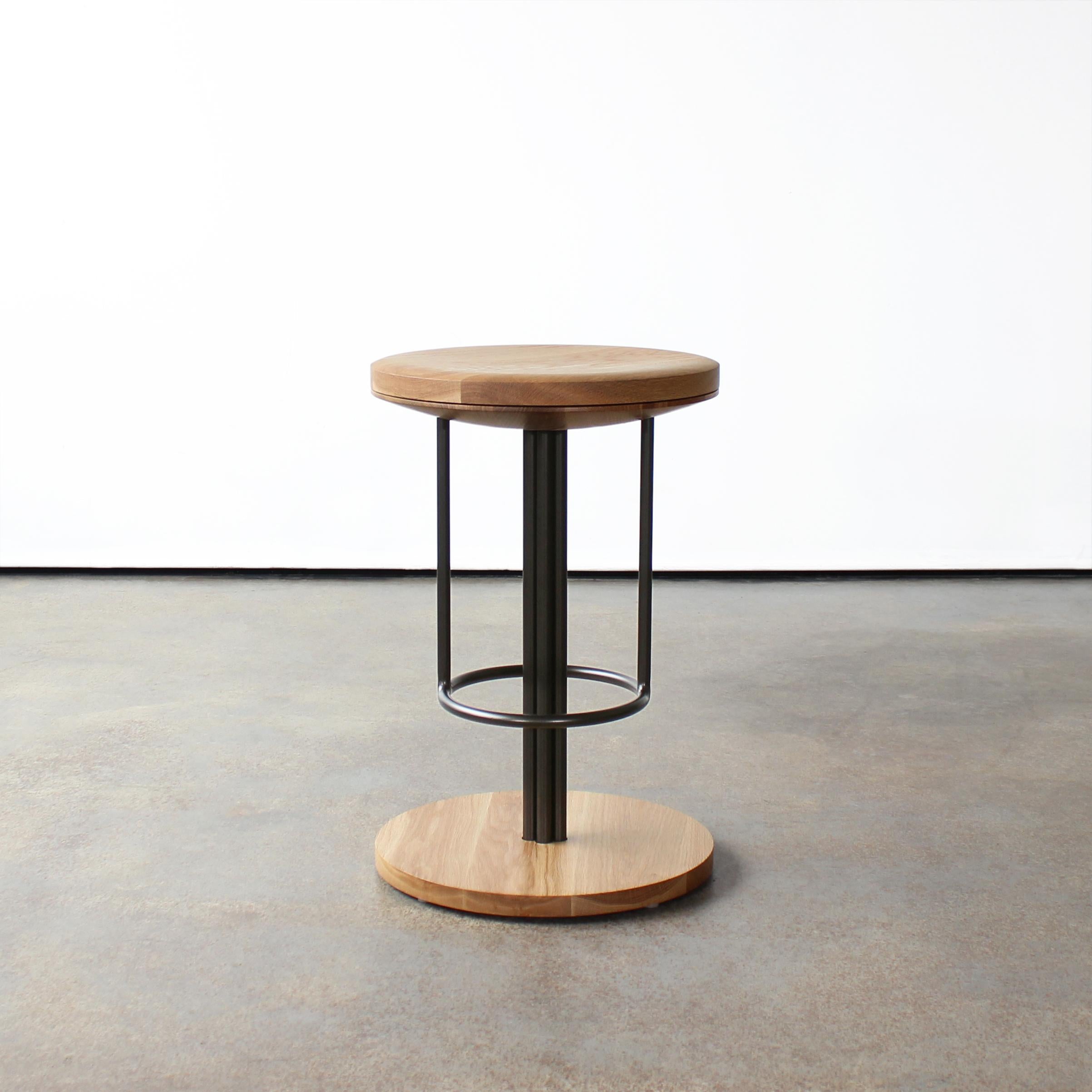 Inez Stool 
by Crump and Kwash

Carved solid wood seat and base / hand rubbed zero VOC oil finish / solid steel construction / 360 degree rotating seat top. 

Offered in barstool (30in) or counter stool (24in) heights

Weight: 40lbs
 
Wood: 