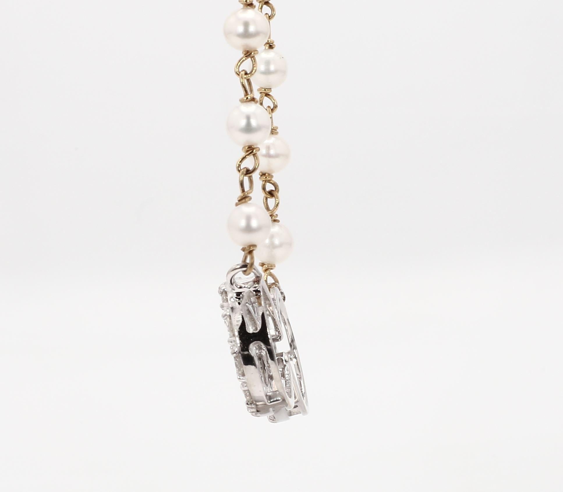 Moderno Ciondolo Infinity con diamanti naturali da 1,34 carati e oro in due tonalità con perle in vendita