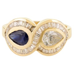 Bague Infinity saphir bleu et diamant en monture tsigane 14k or jaune massif