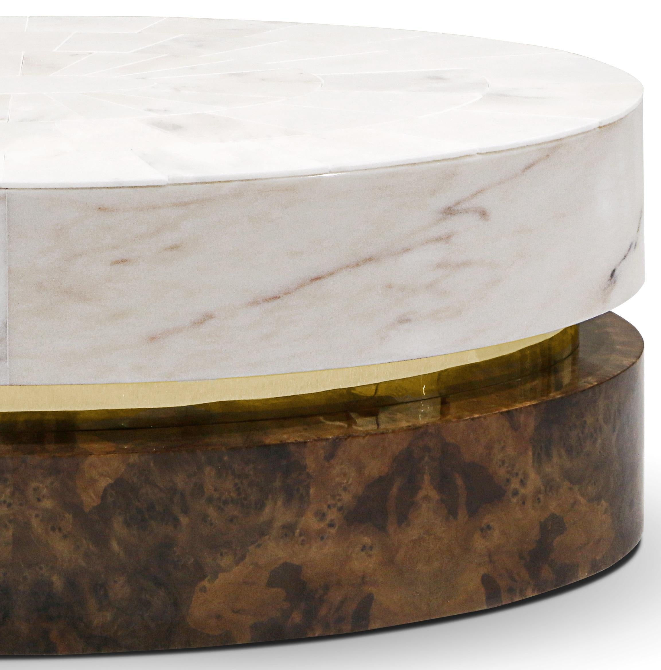 Infinity Center Table by Memoir Essence
Dimensions: D 53 x W 100 x H 35 cm.
Materials: Polished brass, walnut root and white marble.

Also available in brushed brass. Please contact us.

This center table presents an exquisite material selection